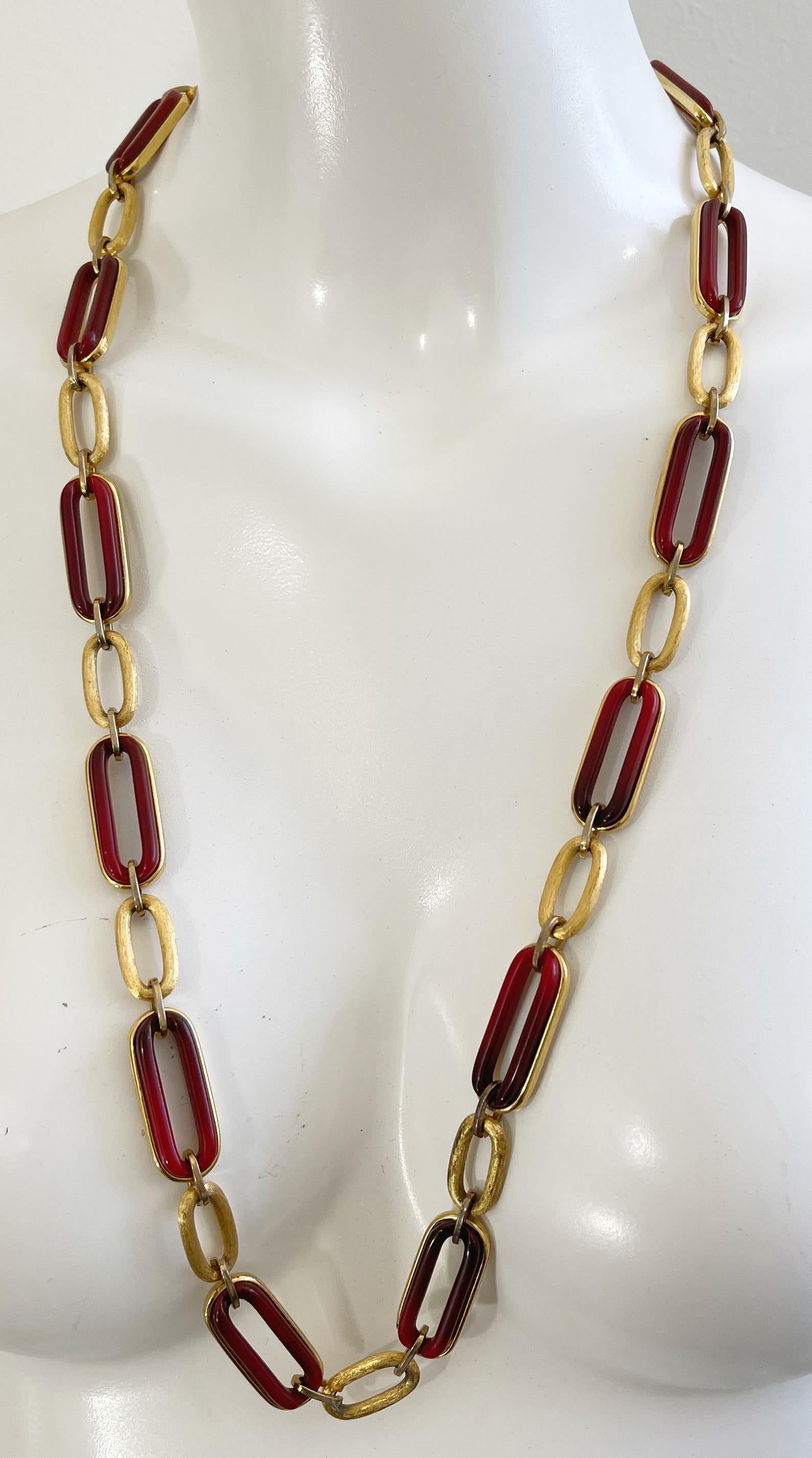 Beautiful vintage 1970s GIVENCHY amber and gold long chain necklace or belt ! Features GG clasp closure. Looks great as a long necklace or wrapped around as a choker. Can also be worn as a belt. The pictured large pendant necklace with amber and