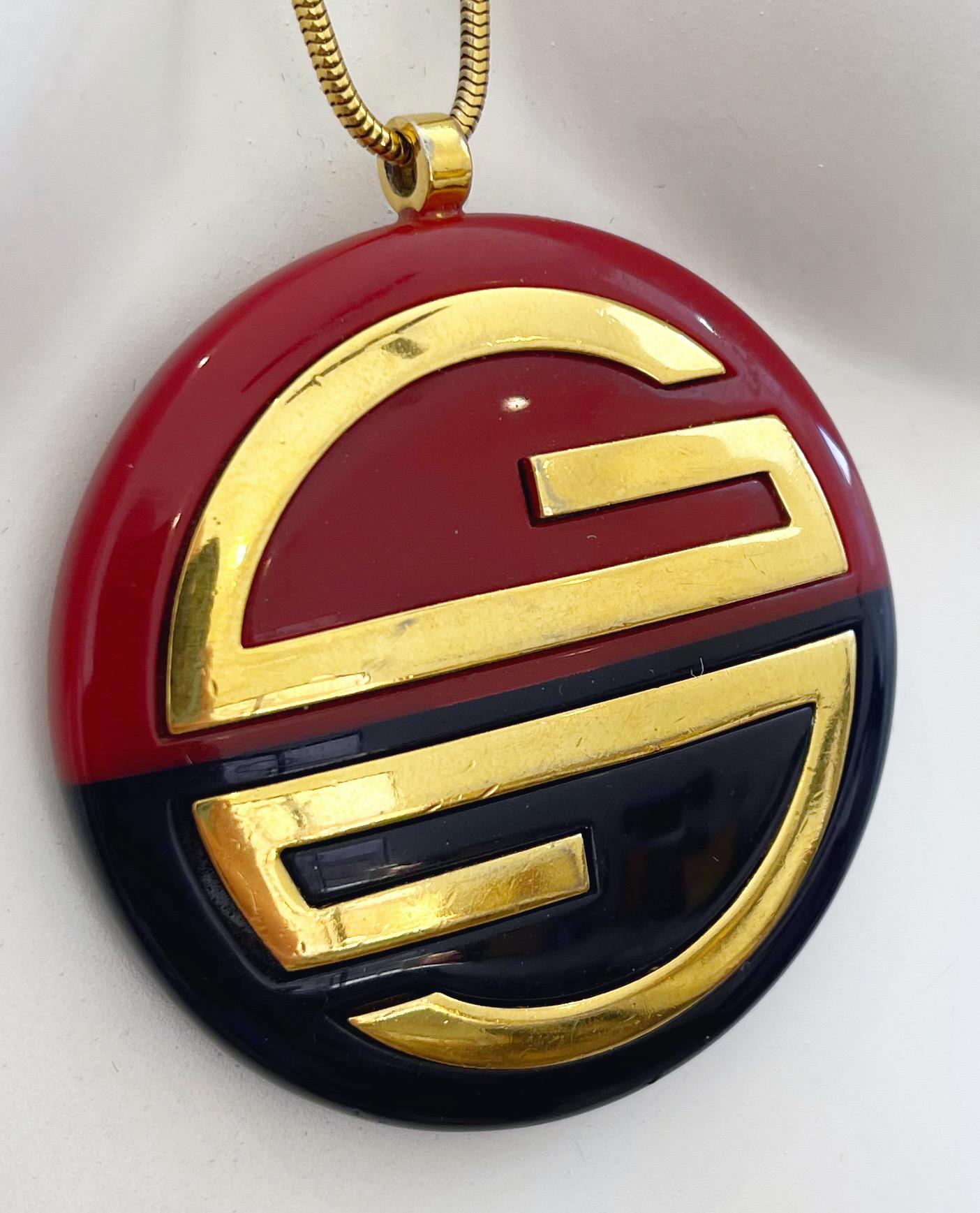 1970s GIVENCHY Navy Amber Gold Plated 1977 Large Statement Logo Vintage Necklace In Excellent Condition For Sale In San Diego, CA