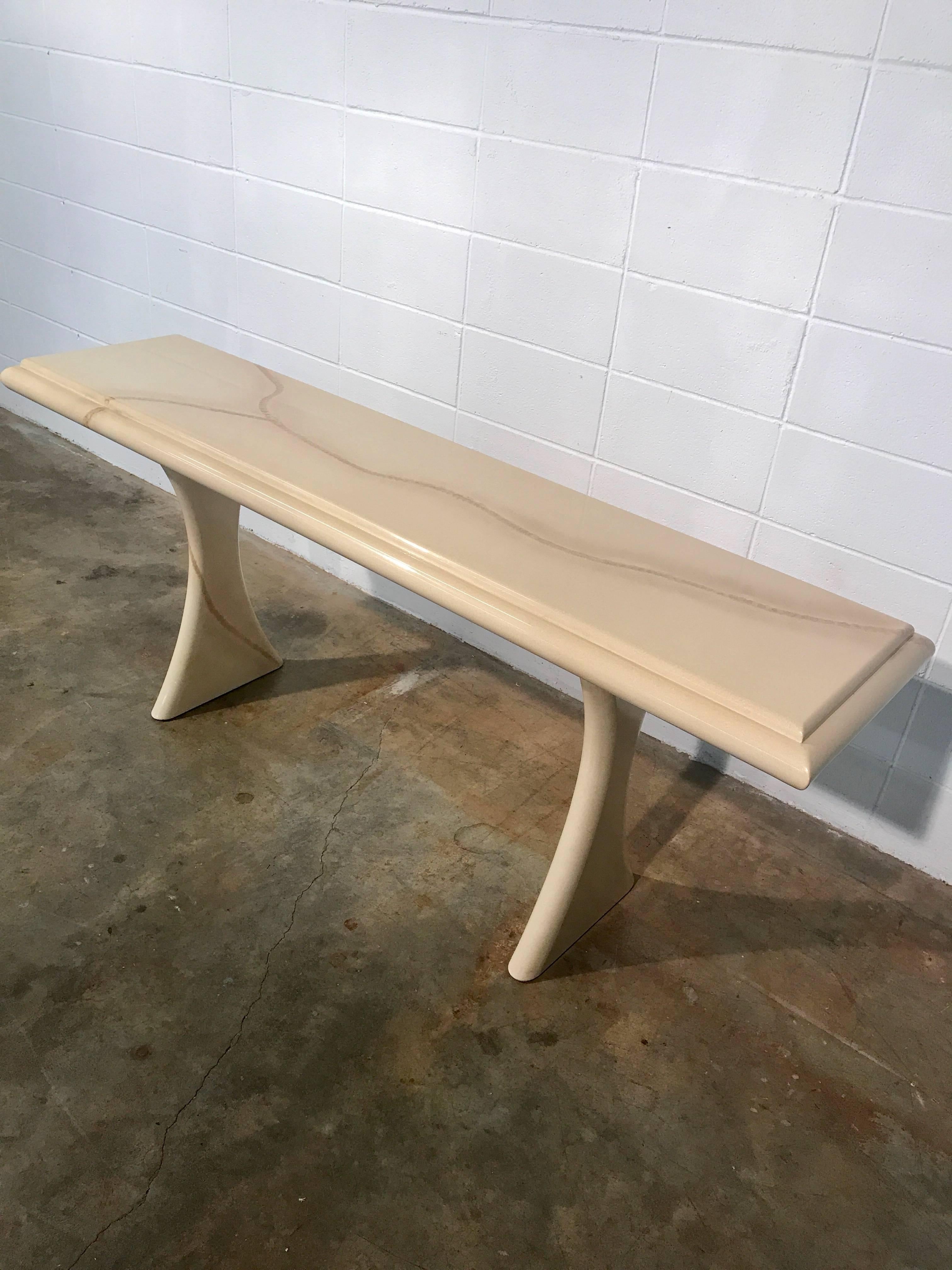 1970s faux parchment console table. Great original condition with very minimal imperfections in the finish. Nothing that detracts from overall aesthetics or value.
Clean and ready for use.
