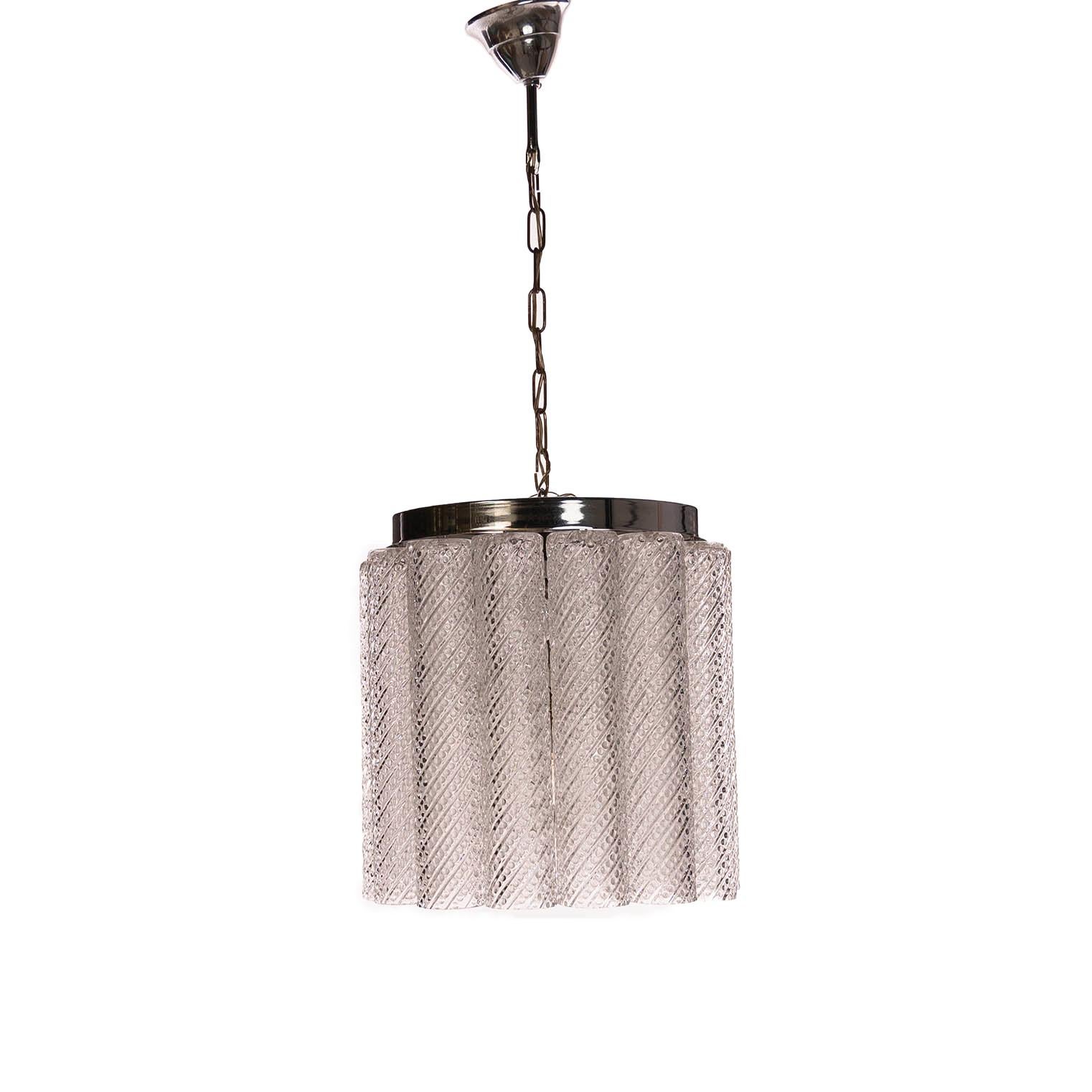 Stylish and sleek pendant with 14 glass tubes each 28 cm long, spiral motive with dots from top to bottom. Fits 4 lightbulbs.