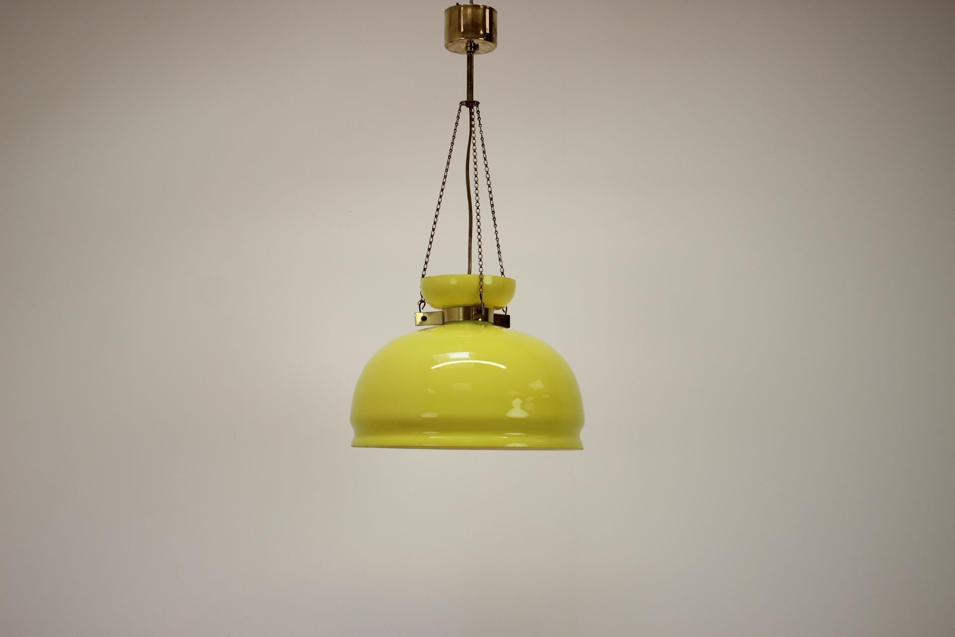 Unique chandelier made in Germany in the 1970's
Made of brass and glass.
Repolished, cleaned, shows signs of use (the entire lampshade is a little tilted, as seen on the photos posted.)
Fully functional.