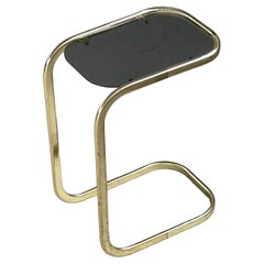 Mesa auxiliar con tapa de cristal de los años 70
