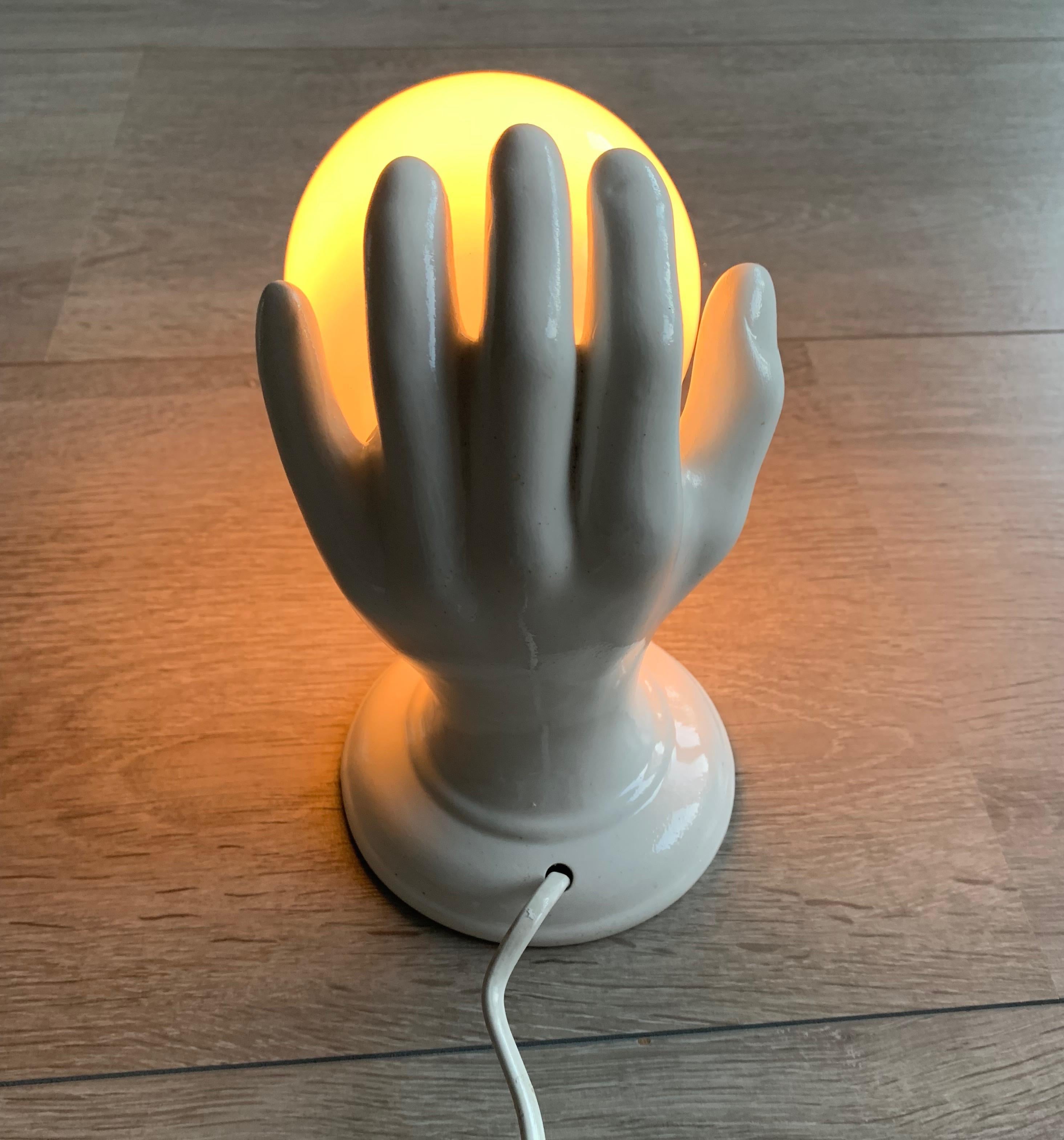 1970s Glazed White Ceramic Hand Holding a Glass Globe Wall Sconce or Wall Light 3