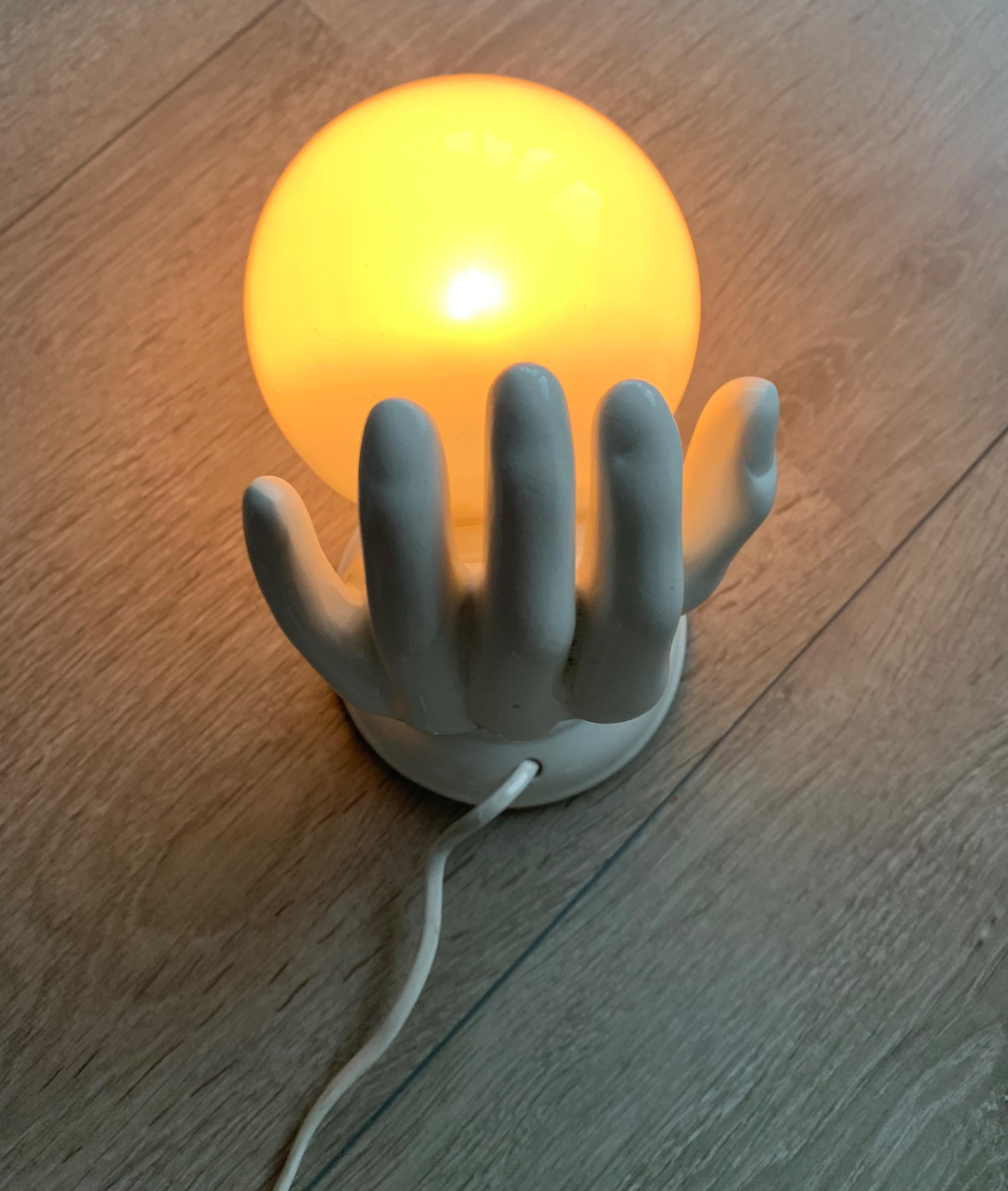1970s Glazed White Ceramic Hand Holding a Glass Globe Wall Sconce or Wall Light 7