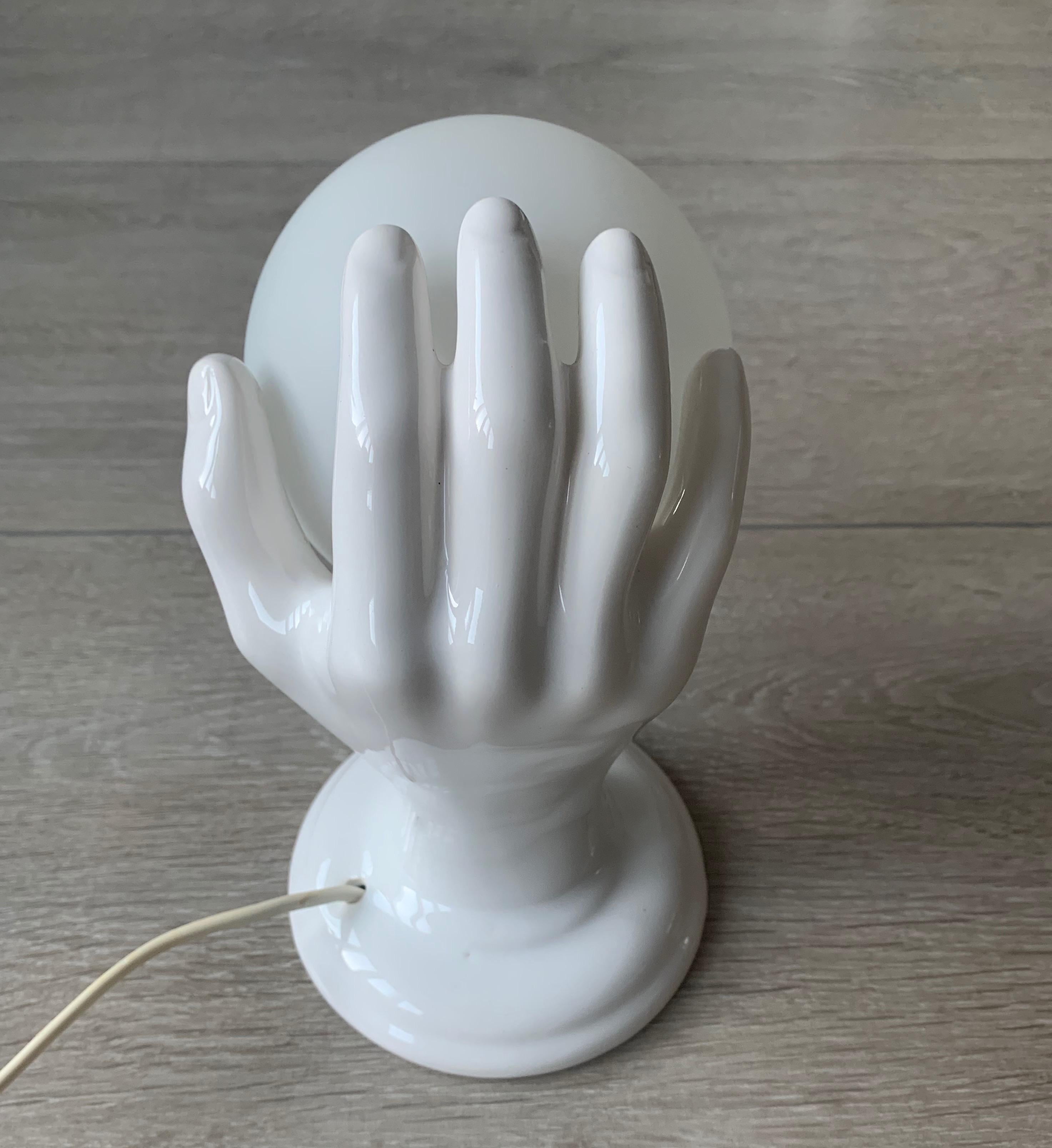 1970s Glazed White Ceramic Hand Holding a Glass Globe Wall Sconce or Wall Light 1