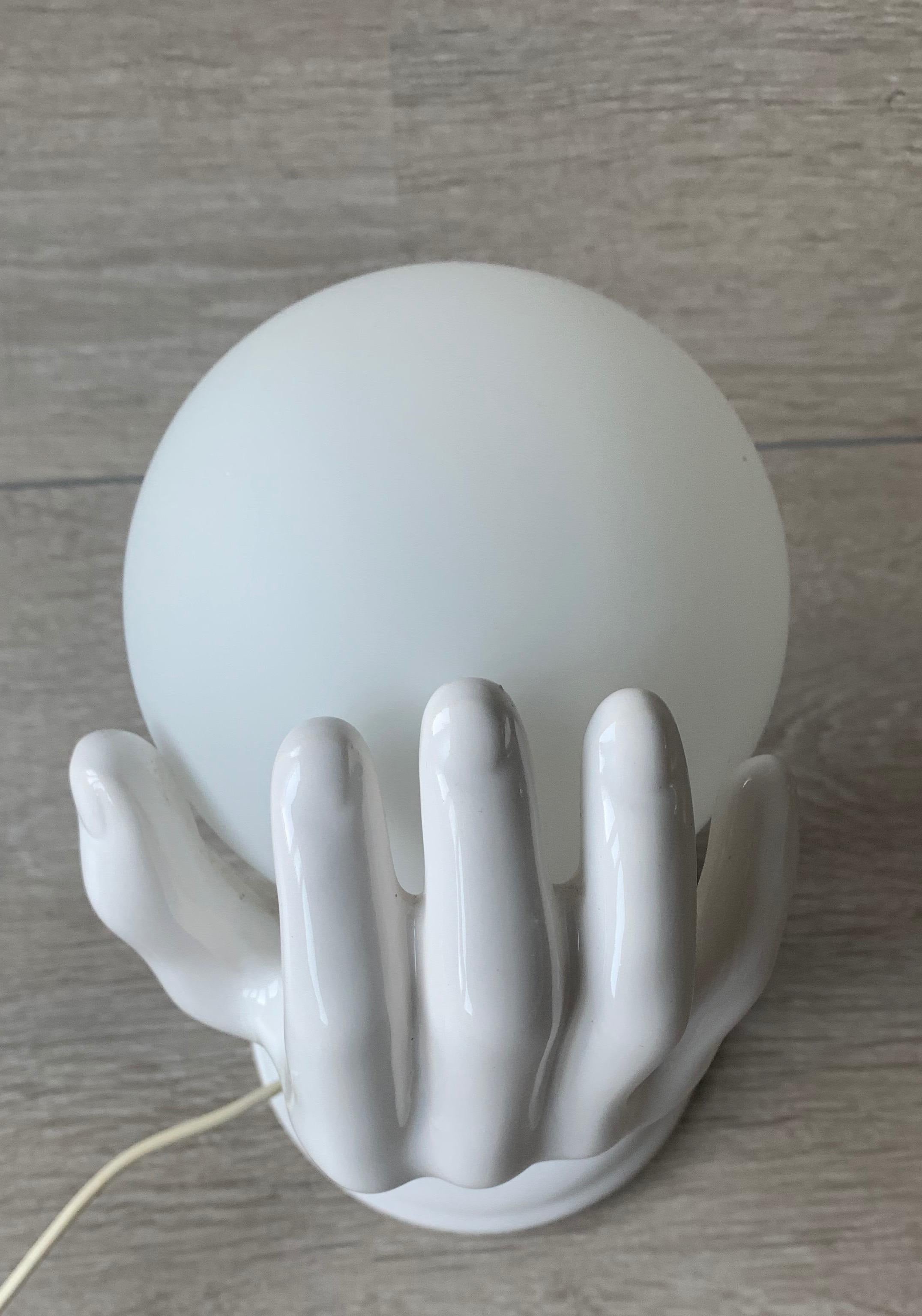 1970s Glazed White Ceramic Hand Holding a Glass Globe Wall Sconce or Wall Light 2