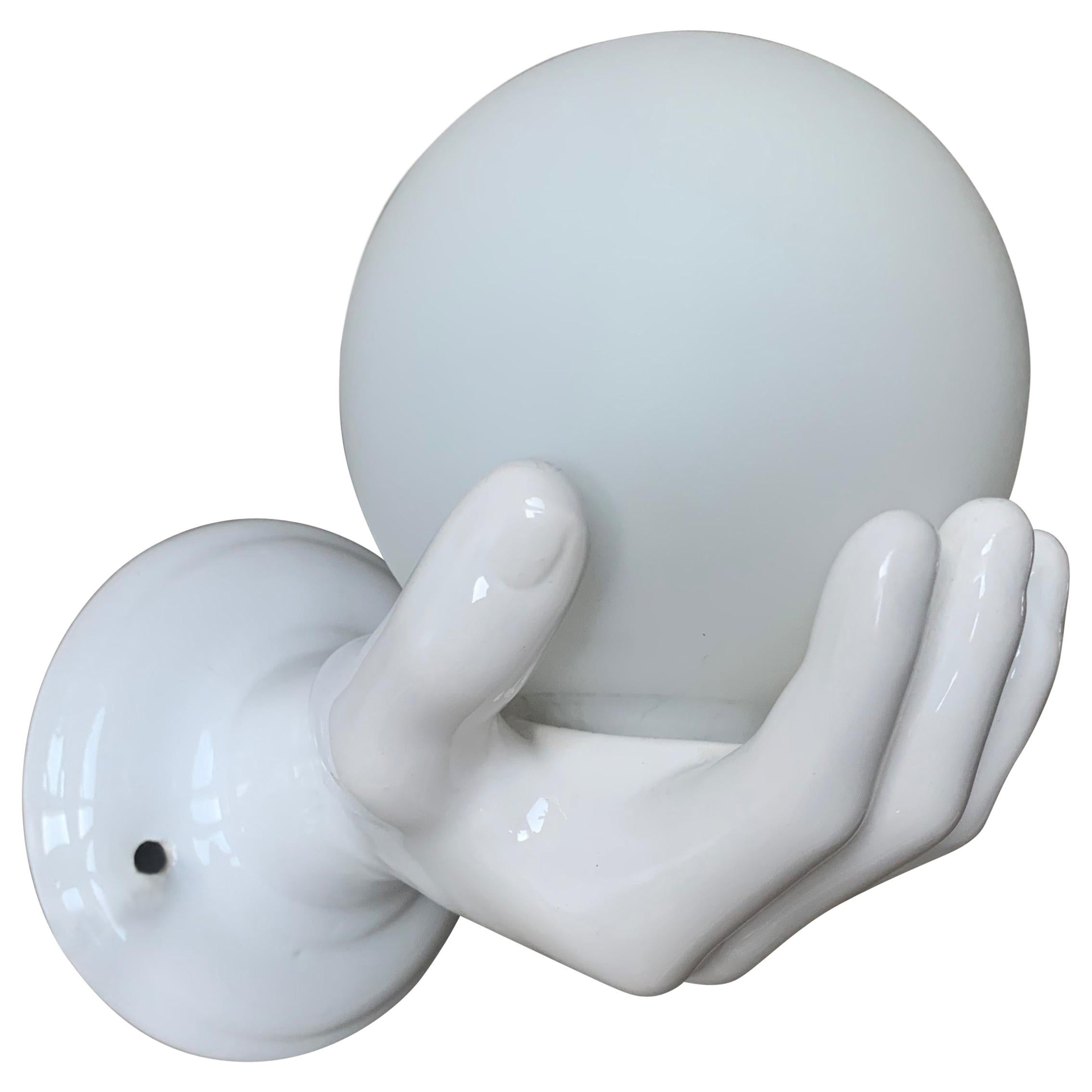 1970s Glazed White Ceramic Hand Holding a Glass Globe Wall Sconce or Wall Light
