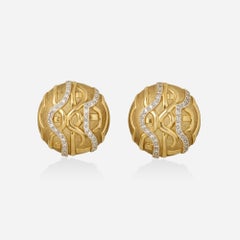 Orecchini a clip con zirconi in oro 9K