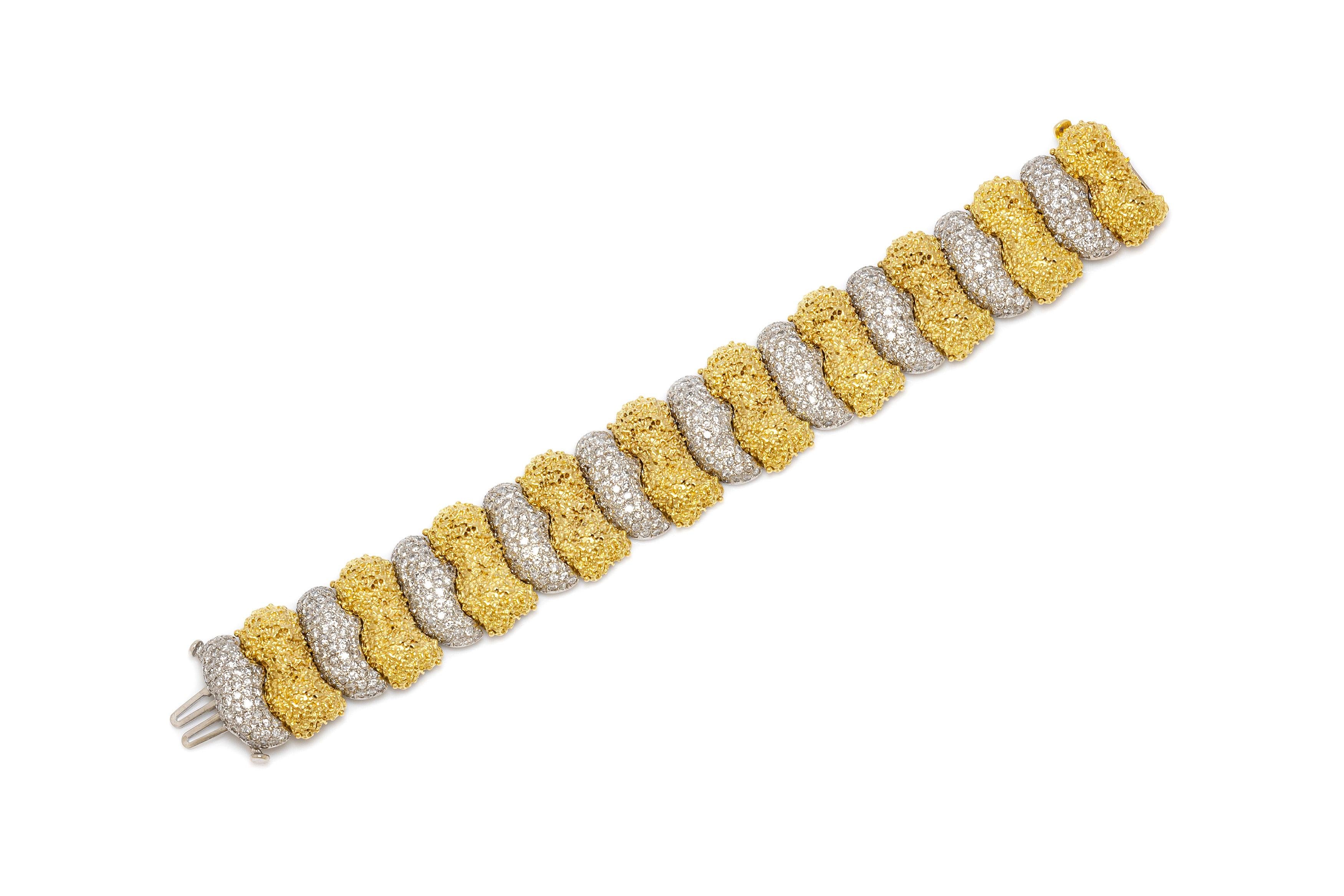 Bracelet finely crafted in 18k yellow and white gold with diamonds weighing a total of 15.00 carat. The length of bracelet is 7.5 inch / 19 cm. Circa 1970's.