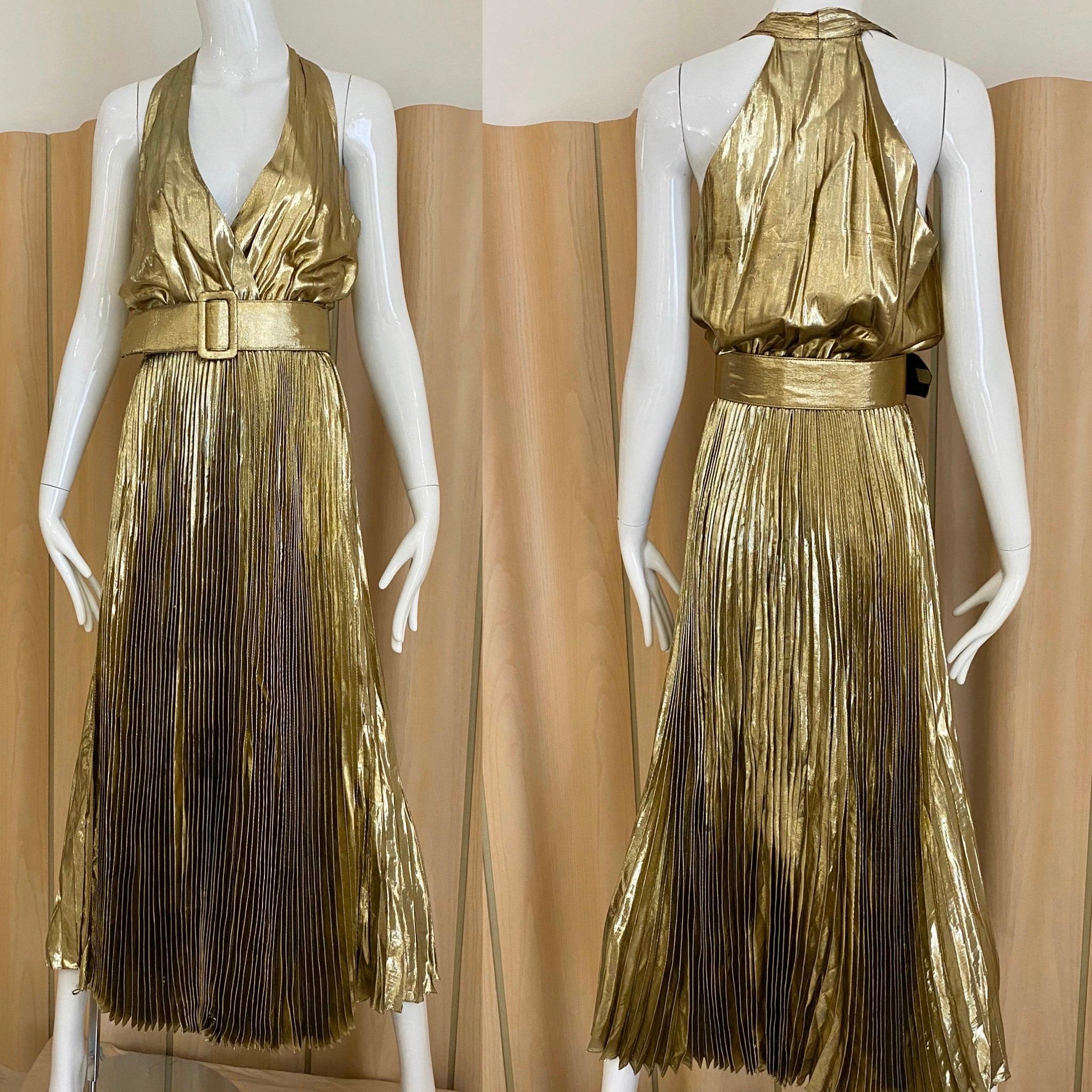 Vintage 70s gold lame halter V neck sleeveless pleated dress with elastic waist and belt.
Bust: 36/ Waist stretch to 32”. Perfect for studio 54 party 
Fit size small to medium
** flaws: see belt