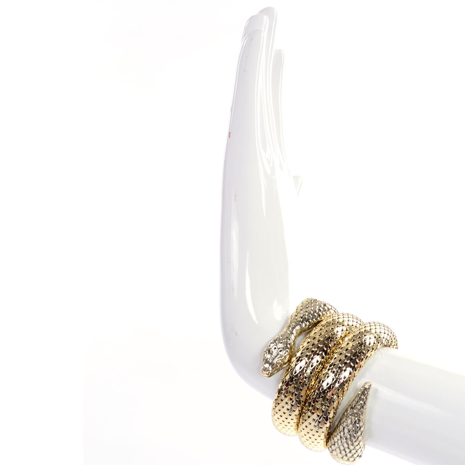 We love snake bracelets and this is one of our favorites!  This Egyptian revival 1970's gold mesh vintage coil bracelet is stamped Whiting and Davis and is the same quality you'd expect from the company known for their beautiful mesh handbags!  We
