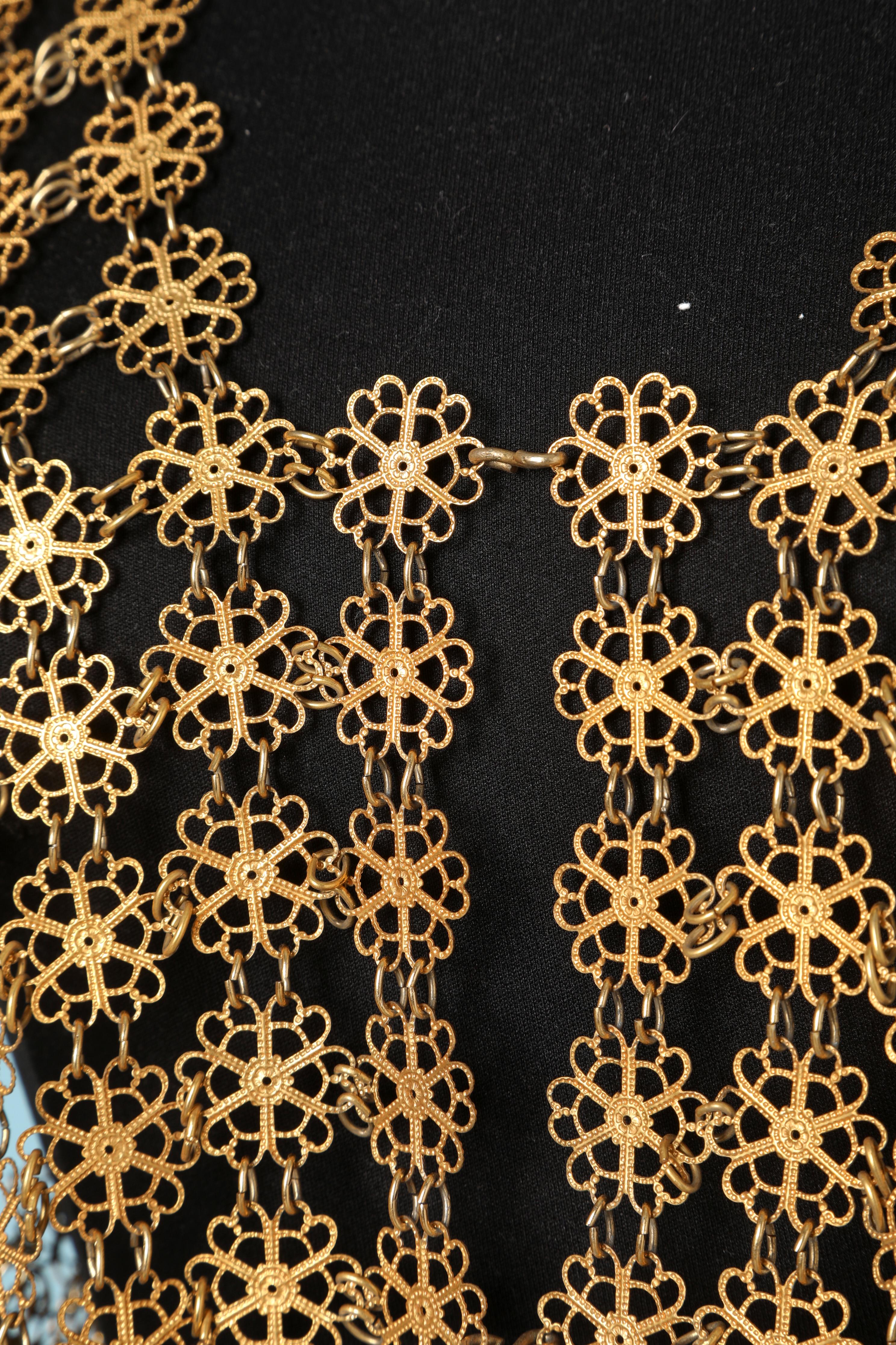 1970's Gold metallic vest in flowers pattern.
Size L