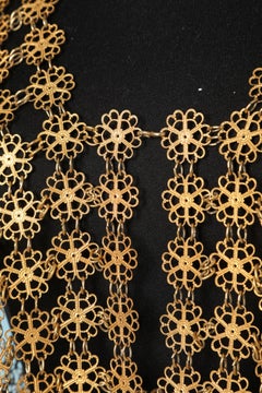 1970's Gold metallic vest in flowers pattern