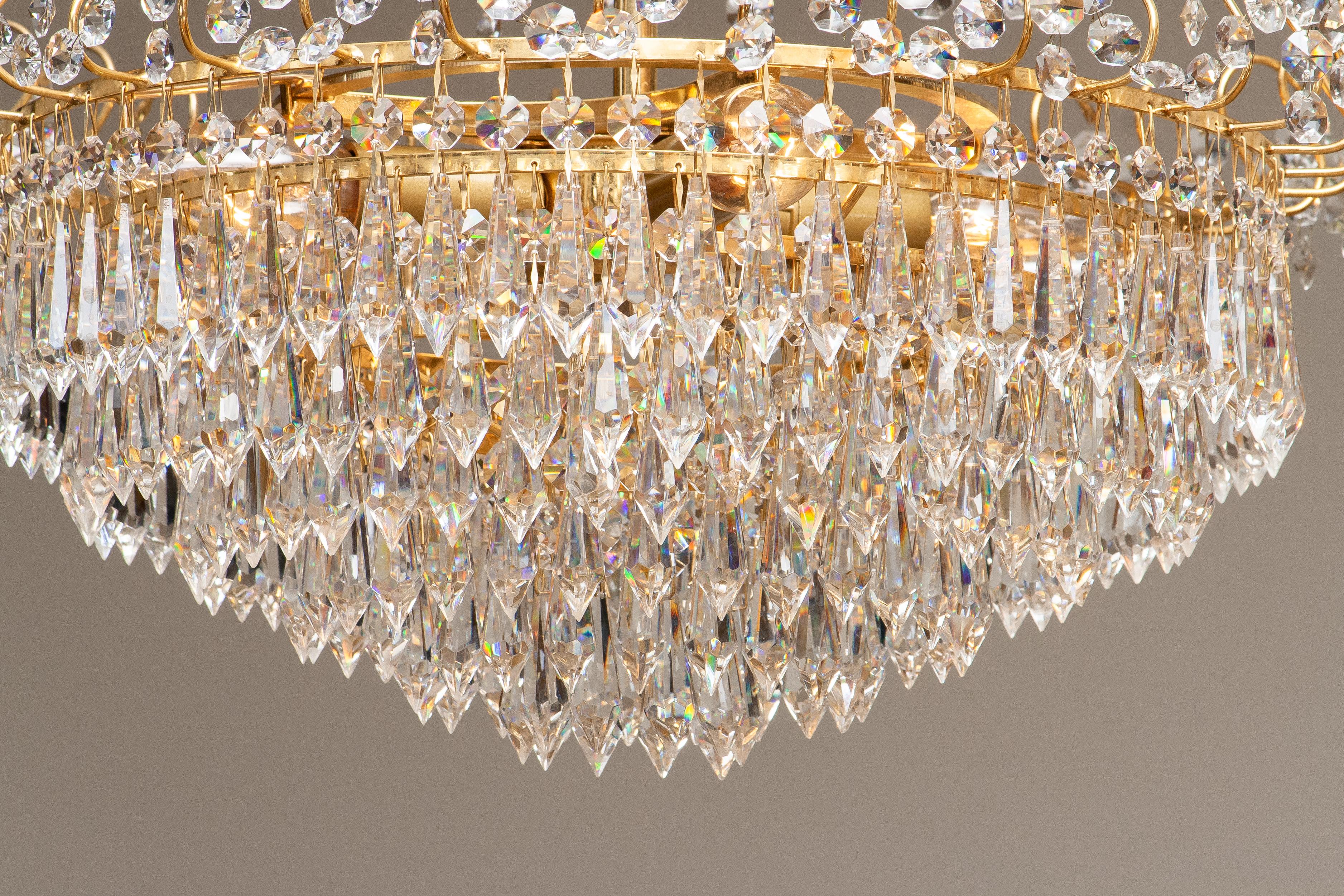 Swedish 1970s, Gold-Plated and Faceted Crystal Chandelier Attributed to Rejmyre Sweden