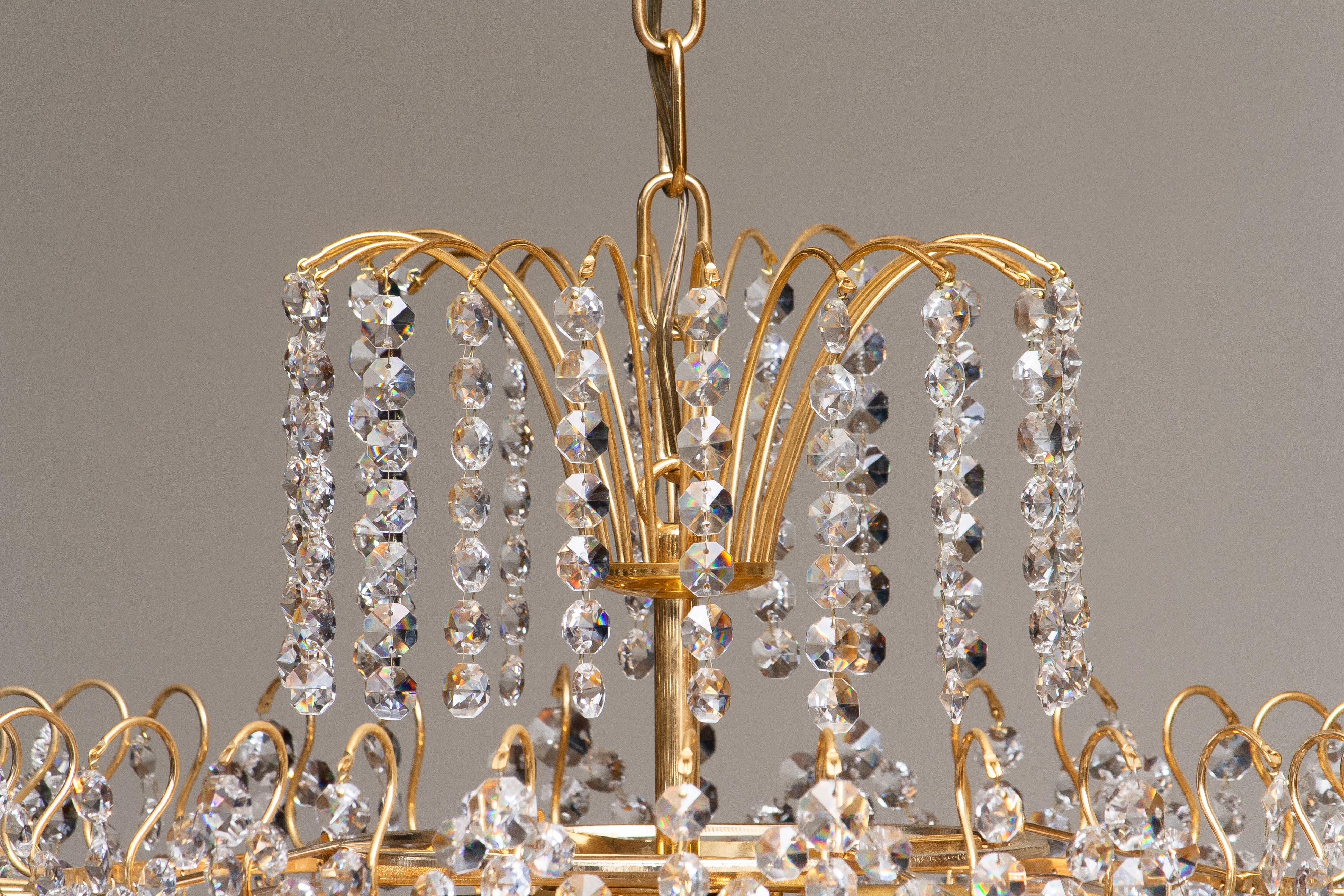 1970s, Gold-Plated and Faceted Crystal Chandelier Attributed to Rejmyre Sweden In Good Condition In Silvolde, Gelderland