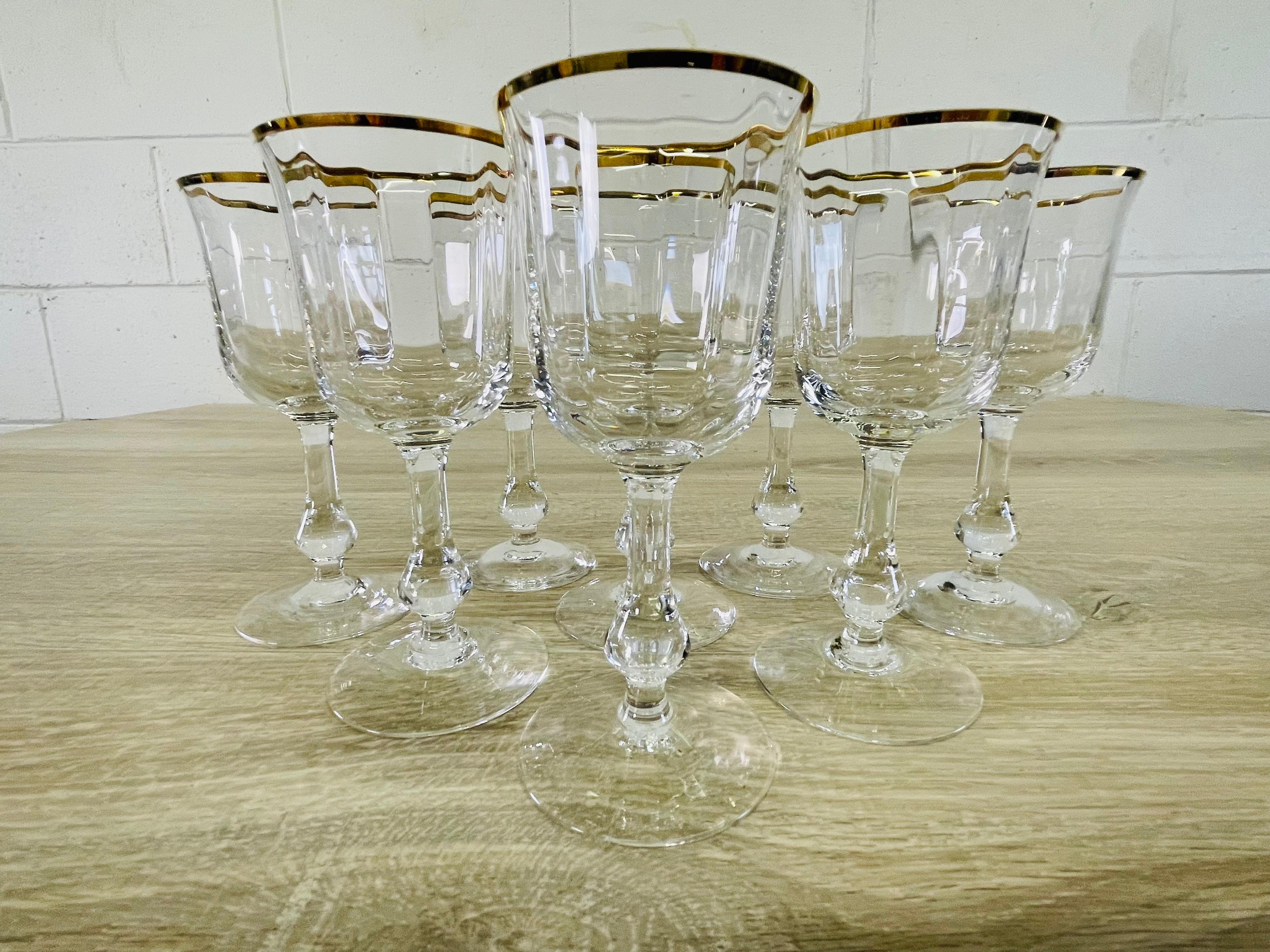 Vintage 1970s set of 8 gold rim glass wine stems. No marks.