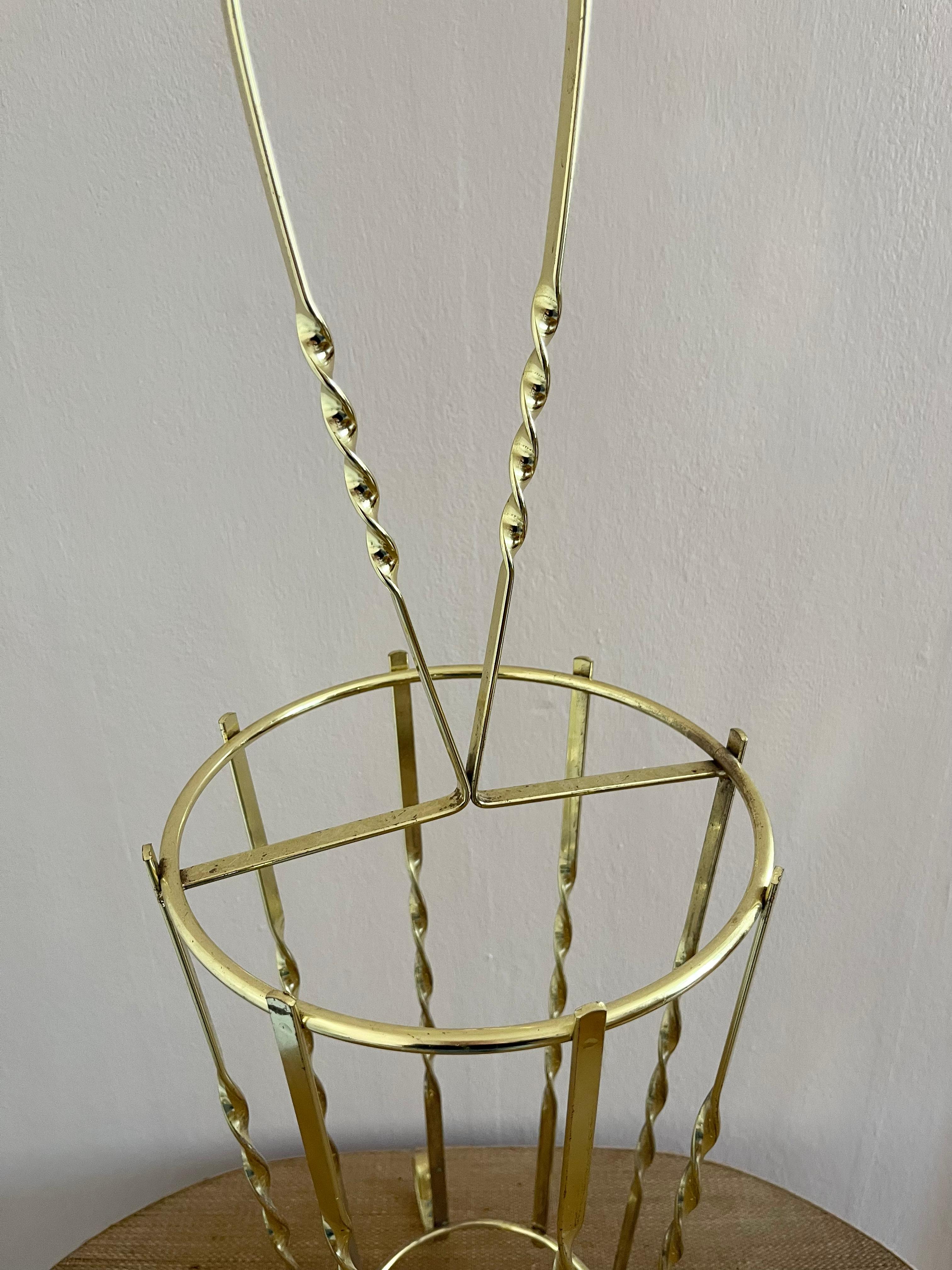 Metal 1970s golden umbrella stand with twisted details For Sale