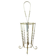 1970s golden umbrella stand with twisted details