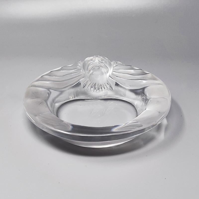 1970s Gorgeous ashtray in crystal by Lalique. Made in France. It's signed at the bottom.
The item is in excellent condition. 
Dimension:
diameter 5,51