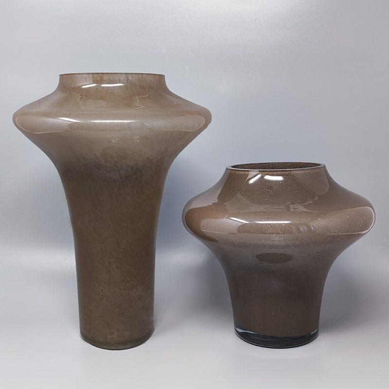 1970s Gorgeous beige pair of vases in Murano glass by Dogi. These vases are two sculptures and they are in excellent conditions. Made in Italy
Diameter 8,26