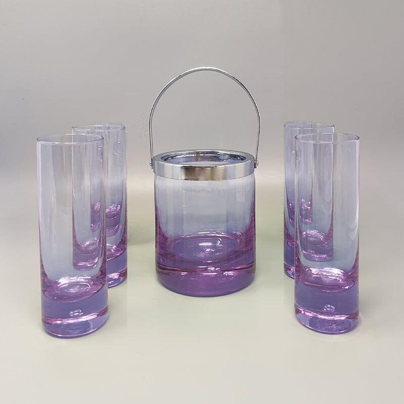 1970s Gorgeous Crystal Ice Bucket with 4 Glasses by Ivat. Made in Italy. The items are in excellent condition and the set is signed.
Dimension:
Ice Bucket
diameter 4,33 x 5,51 H inches
diameter cm 11 x cm 14 H
Glasses
diameter 2,16 x 7,08 H