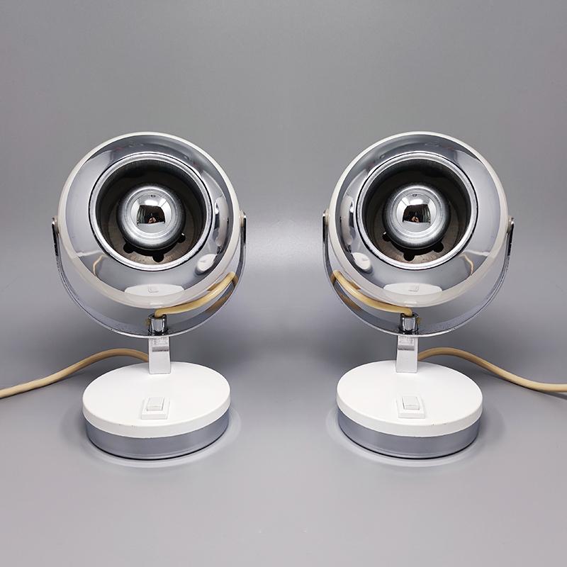 1970s Gorgeous pair of white eyeball table lamps by Veneta Lumi. Made in Italy.
The lamps work perfectly, some signs of aging on them but however they are in excellent condition. These lamps are signed at the bottom.
Dimension:
diameter 3,93