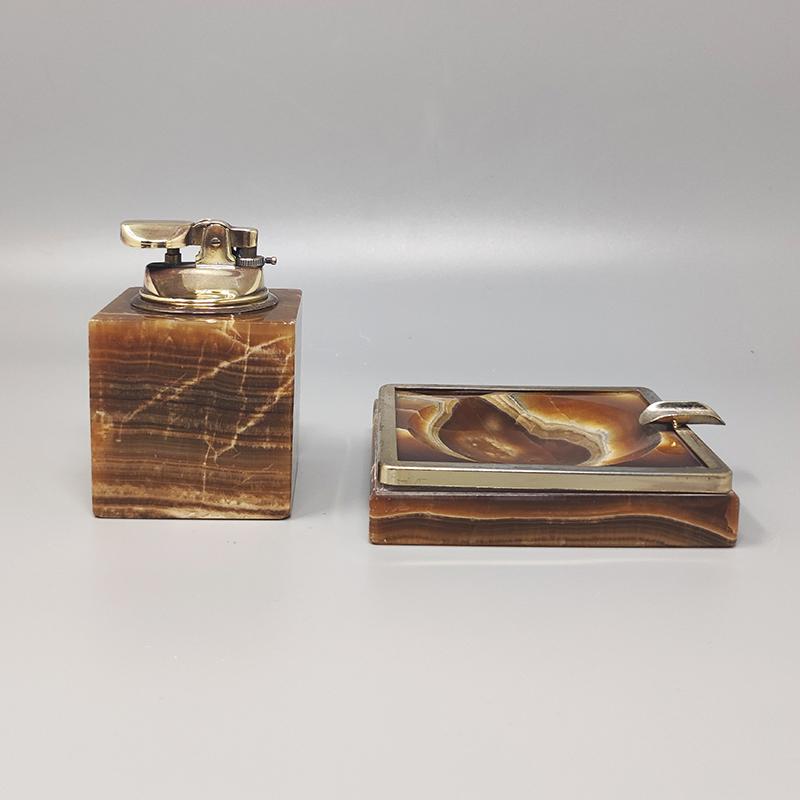 1970s Gorgeous smoking set in onyx. The table lighter works perfectly. Made in Italy. The items are in excellent condition.
Dimension:
Table Lighter
2,36