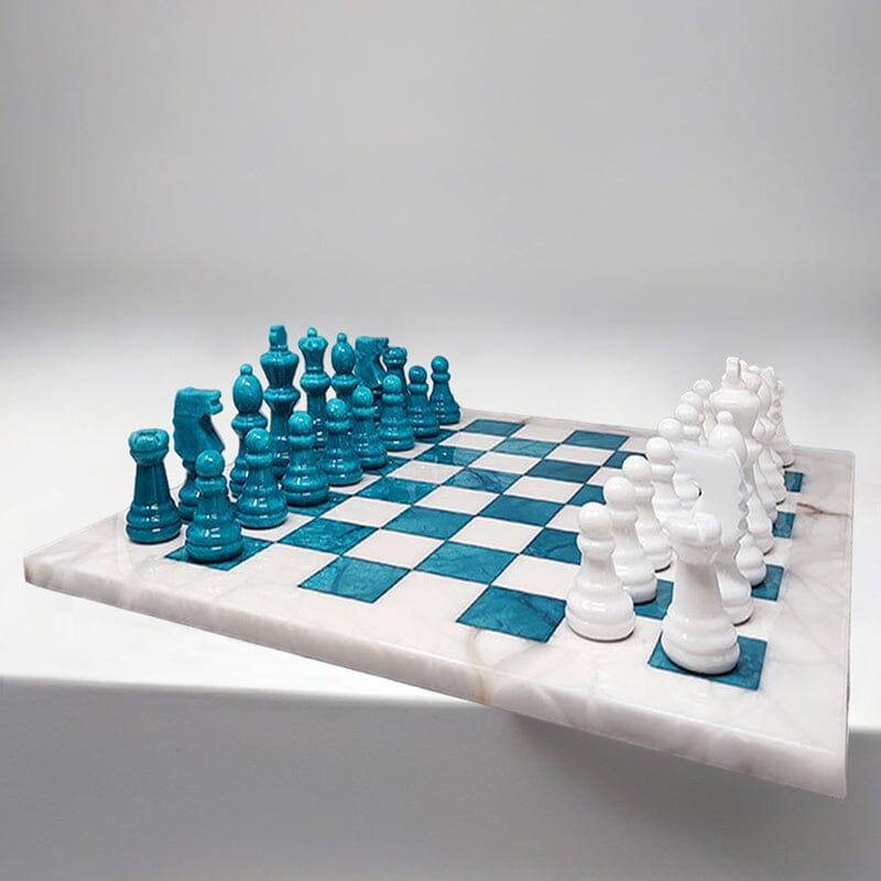 1970s Gorgeous turquoise and white chess set in Volterra alabaster. Handmade Made in Italy, the items are in excellent condition. So rare to find in this color
This chess set is a beautiful piece of modern art.
Dimensions:
14,56