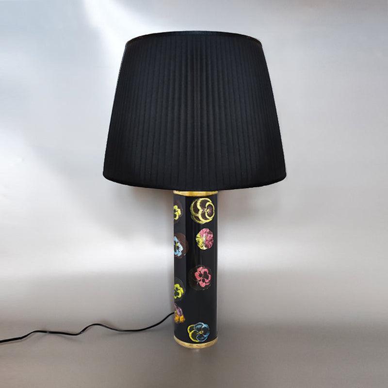 1970s Gorgeous unique Piero Fornasetti Table Lamp. Made in Italy. This lamp is unique and is in excellent condition, signed at the bottom and it works perfectly. The black silk lamp shade is included.
Dimension with the lamp shade
diameter 15,74