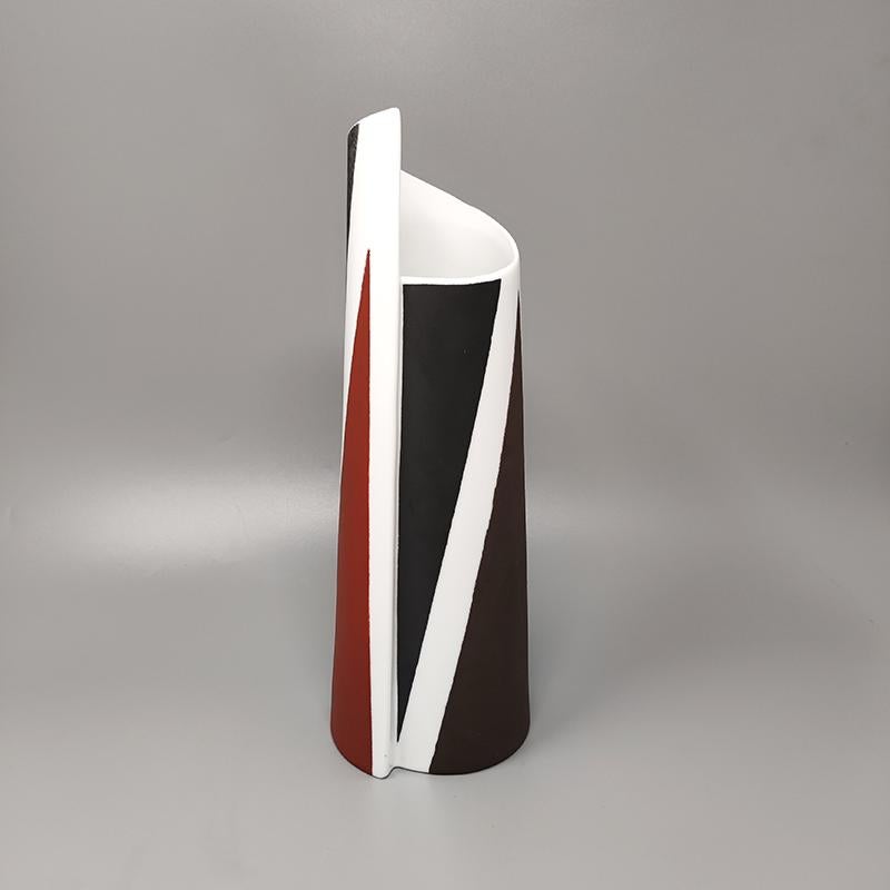 1970s Gorgeous vase in ceramic by Emilio Pucci. This vase is in excellent condition. Made in Italy.
Dimension:
Diameter 3,93 x 13,77 Height inches
Diameter cm 10 x 35 Height cm.