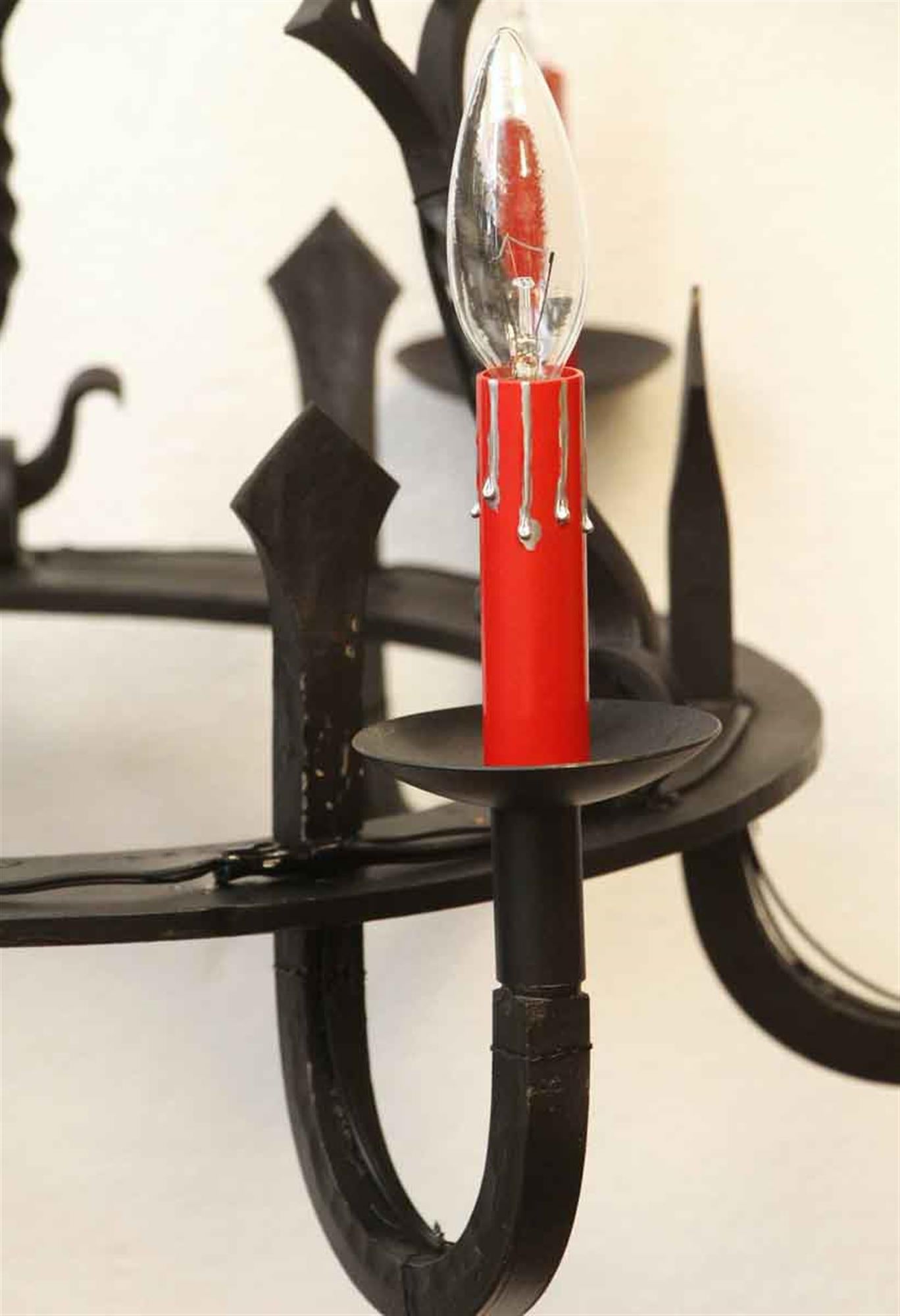 French 1970s Gothic Black Wrought Iron Chandelier Red Candle Sleeves