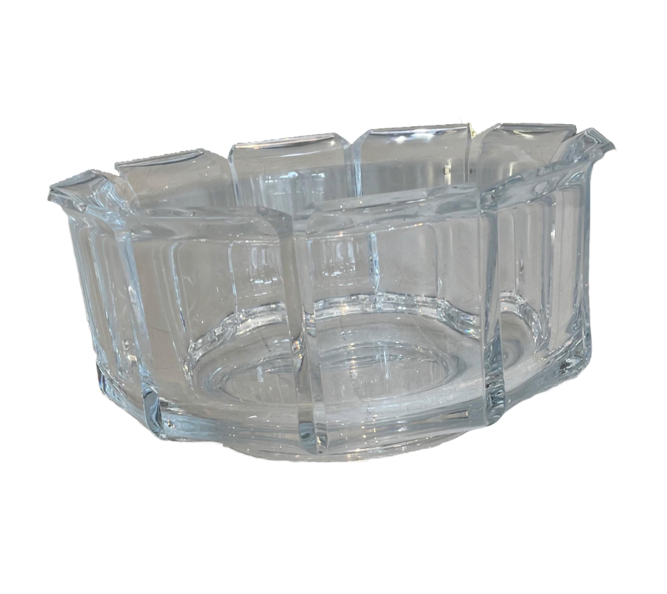 The 1970s grainware angular regal Lucite bowl, designed by American Designer William Bounds, is a unique and stylish piece of home decor that has gained popularity among collectors and design enthusiasts. Bounds founded his company, William Bounds,