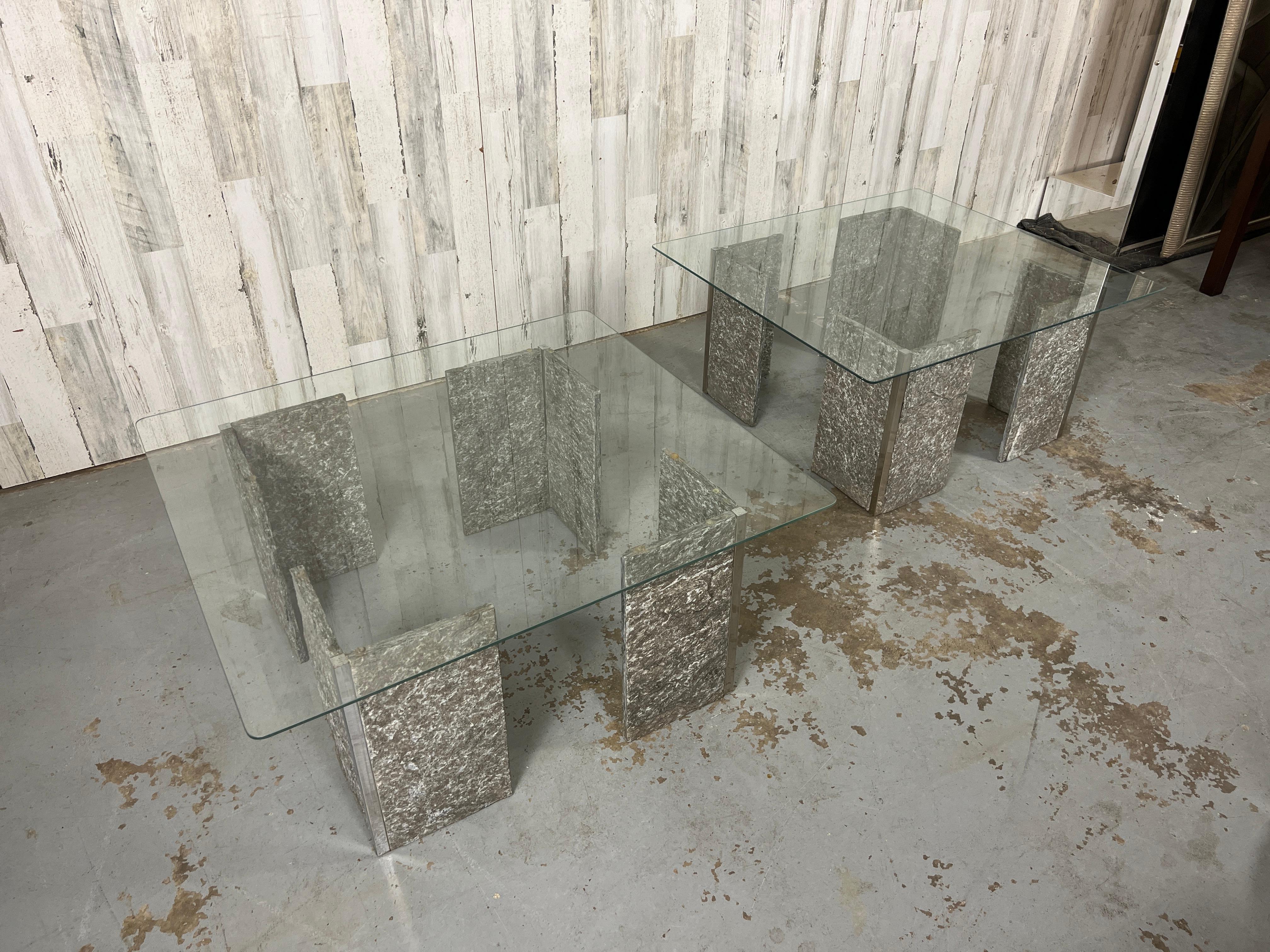 Chiseled granite conjoined with stainless steel corners and floating glass top end tables.
Each Leg is 8 3/4 Wide and deep. 15 3/4 high
Glass is 31 3/4 x 36
Glass is optional.