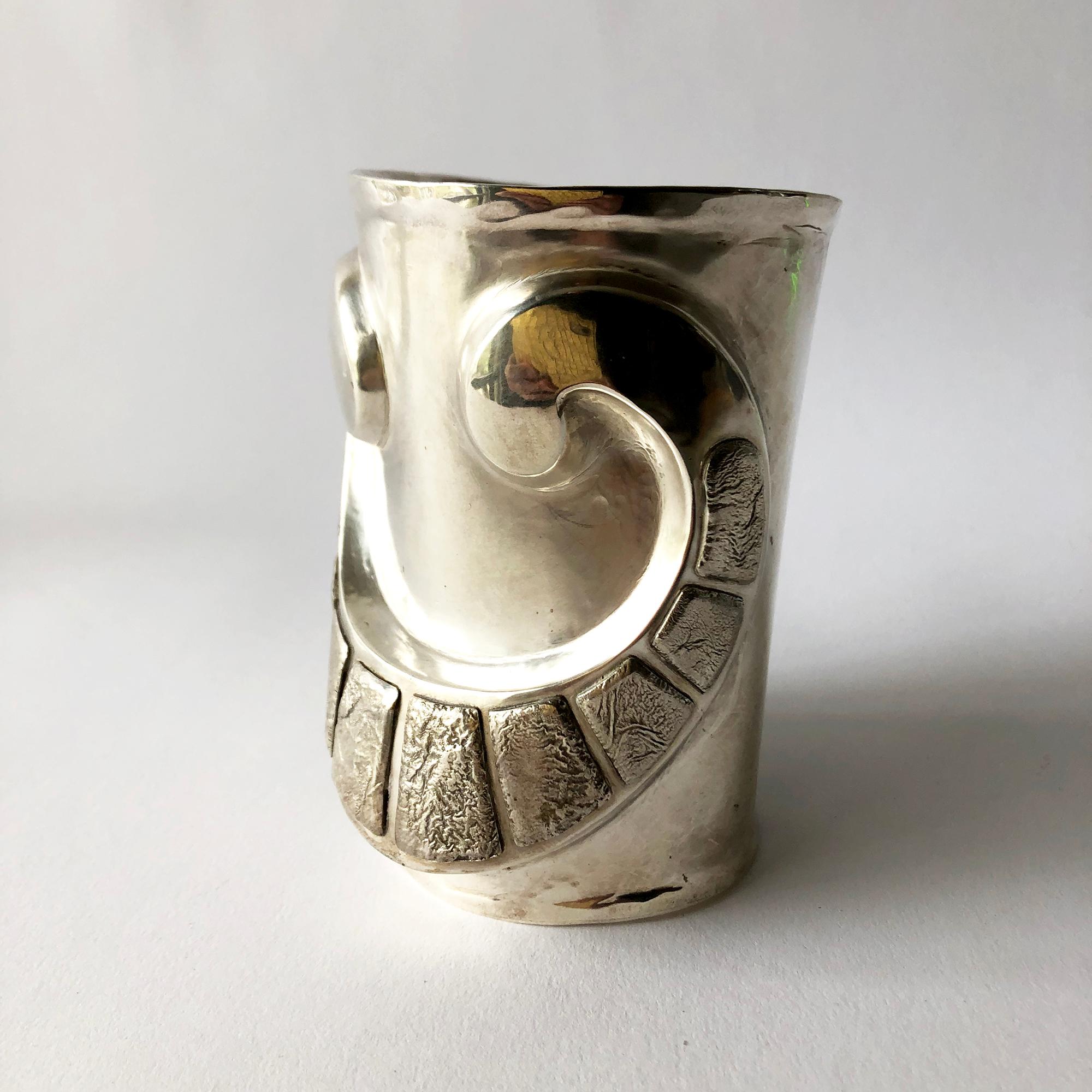 Large scale sterling silver repoussé cuff bracelet created by Graziella Laffi of Lima, Peru, circa 1970's.
Bracelet measures 4.5