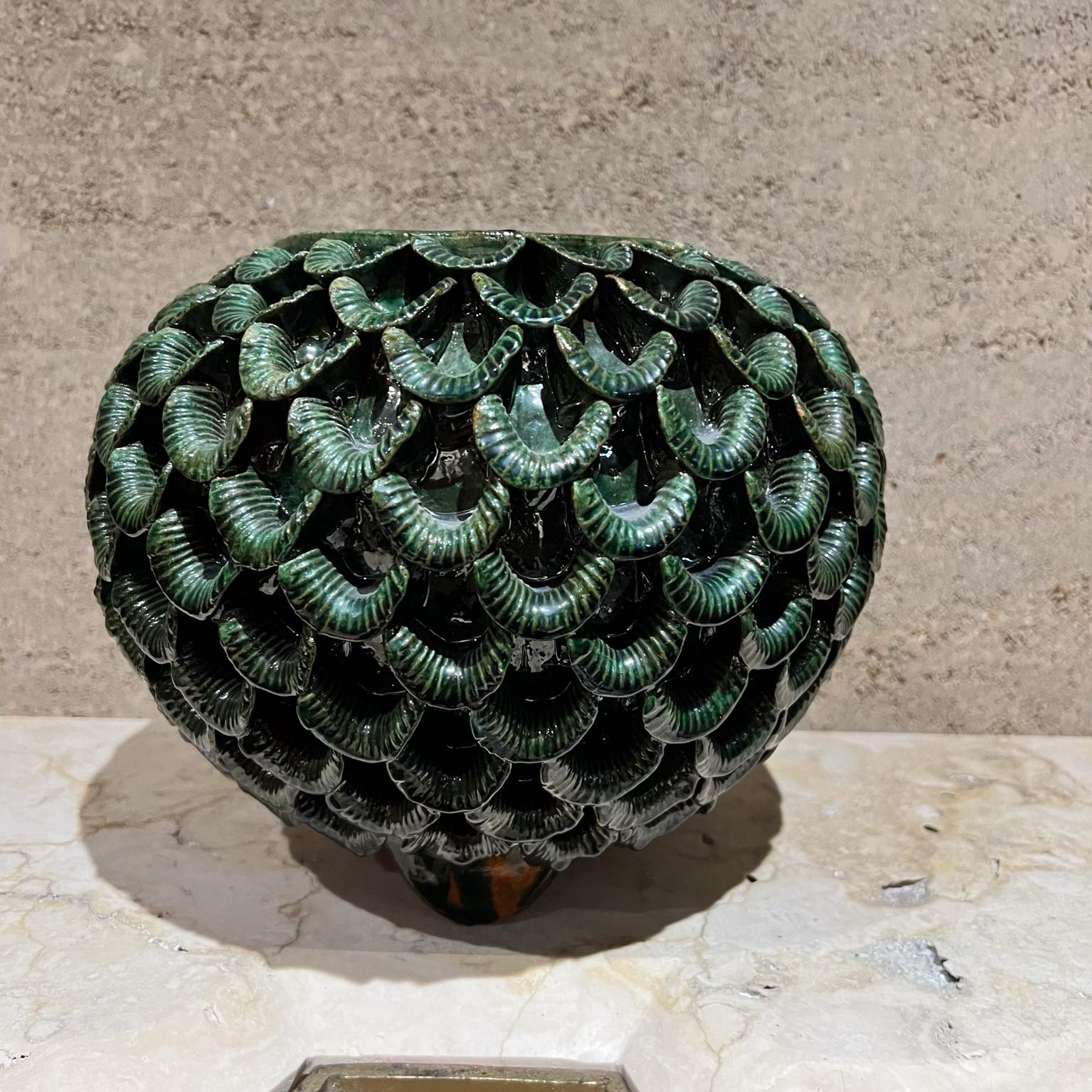 1970s Green Art Pottery Vase Piña Ceramics Michoacán Mexico
8.5 h x 10 diameter
Unsigned
Nicks chipping present
Unrestored original preowned condition
Refer to images provided.