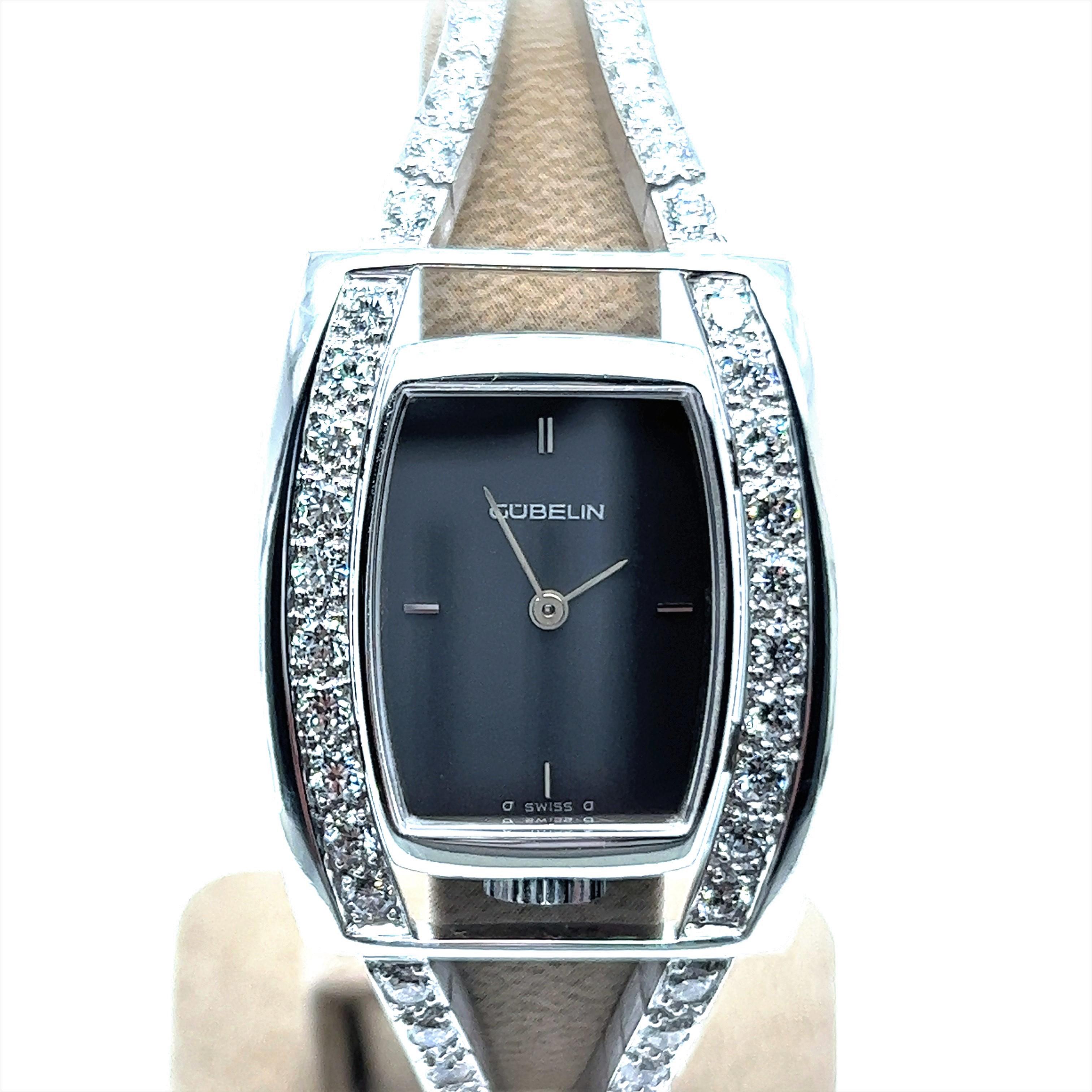 Designed as two parting rivière bracelets embracing the tonneau shaped case. Case and strap both crafted in 18 karat white gold. Set in two lines with 48 full brilliant-cut diamonds of 1.92 cts total weight. Fine G/H-vvs quality. Attractive