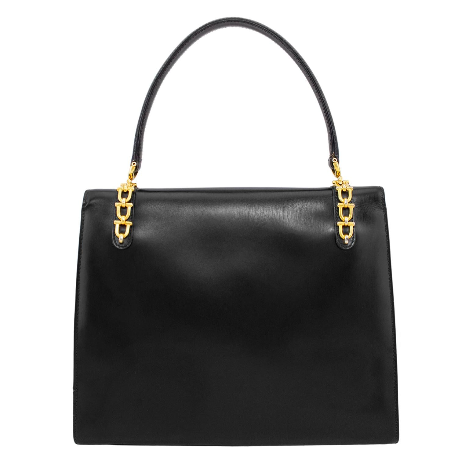1970s Gucci Black Supple Leather Top Handle Bag with Gold Bit Details  In Good Condition In Toronto, Ontario