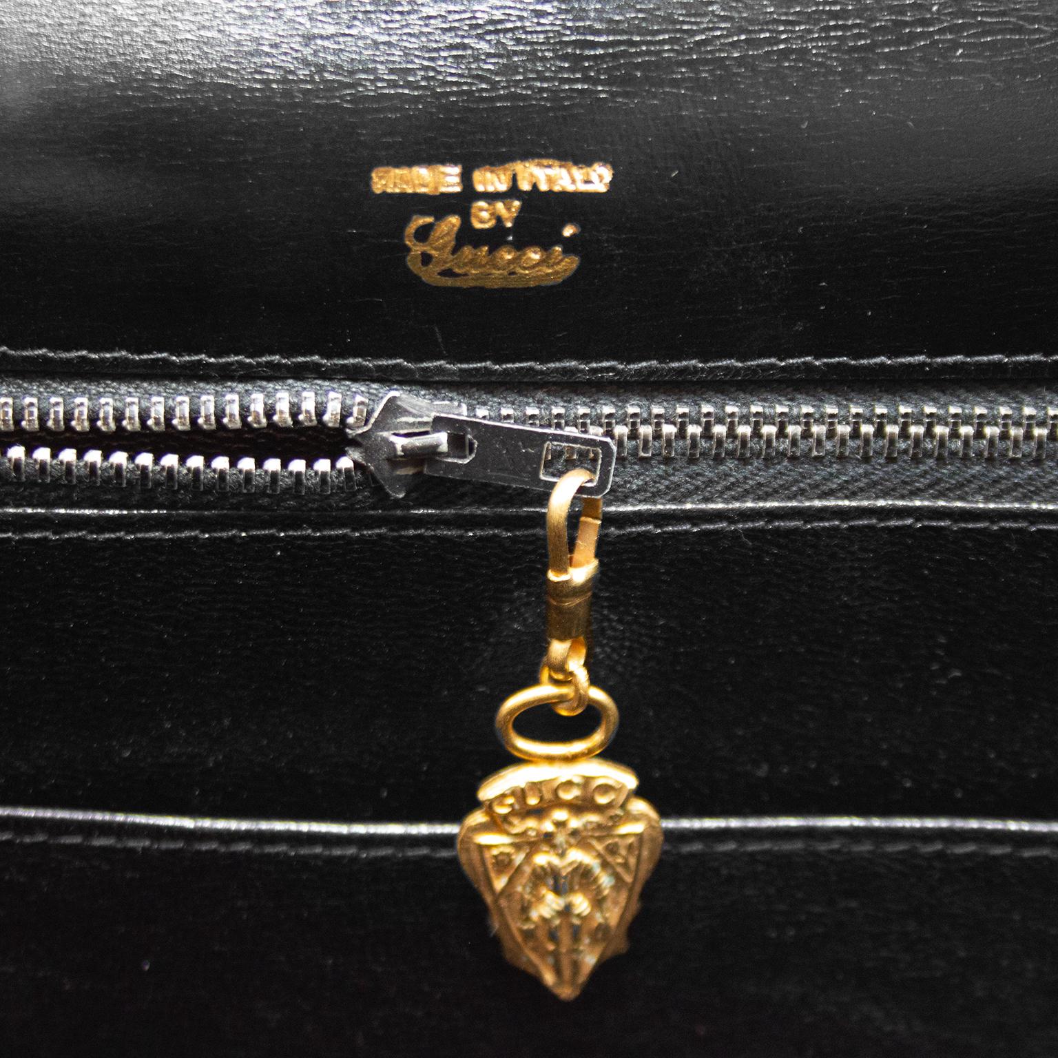 1970s Gucci Black Supple Leather Top Handle Bag with Gold Bit Details  2