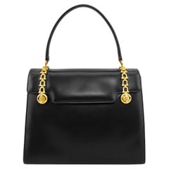 Vintage 1970s Gucci Black Supple Leather Top Handle Bag with Gold Bit Details 
