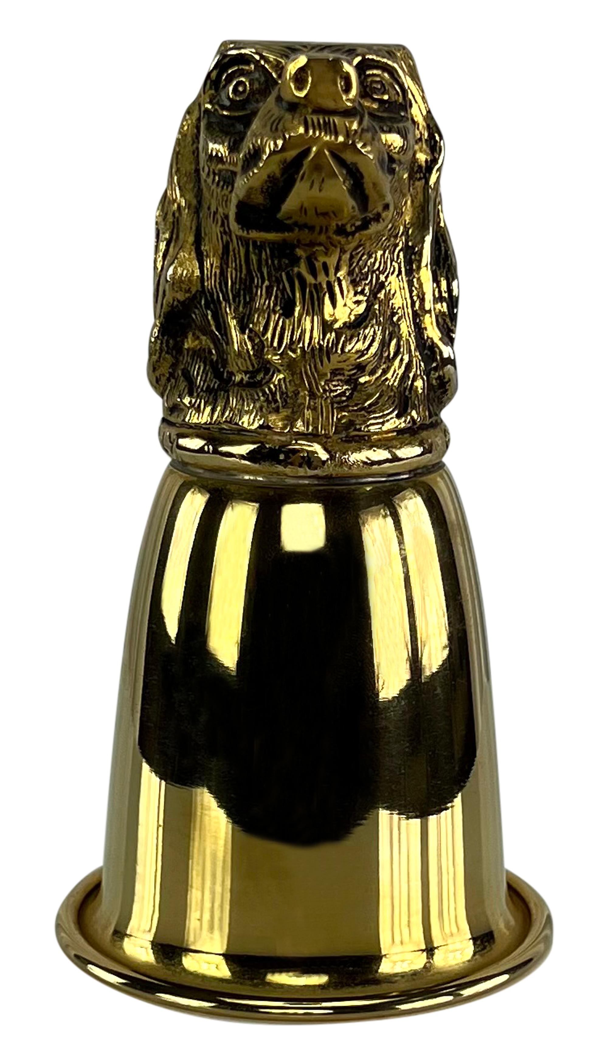 This pair of goldwashed Gucci hunting cups from the 1970s is a chic addition to any bar. The cups, with their shiny gold-tone finish, feature a sculptural hunting dog base, making them both a functional and decorative accessory

Approximate