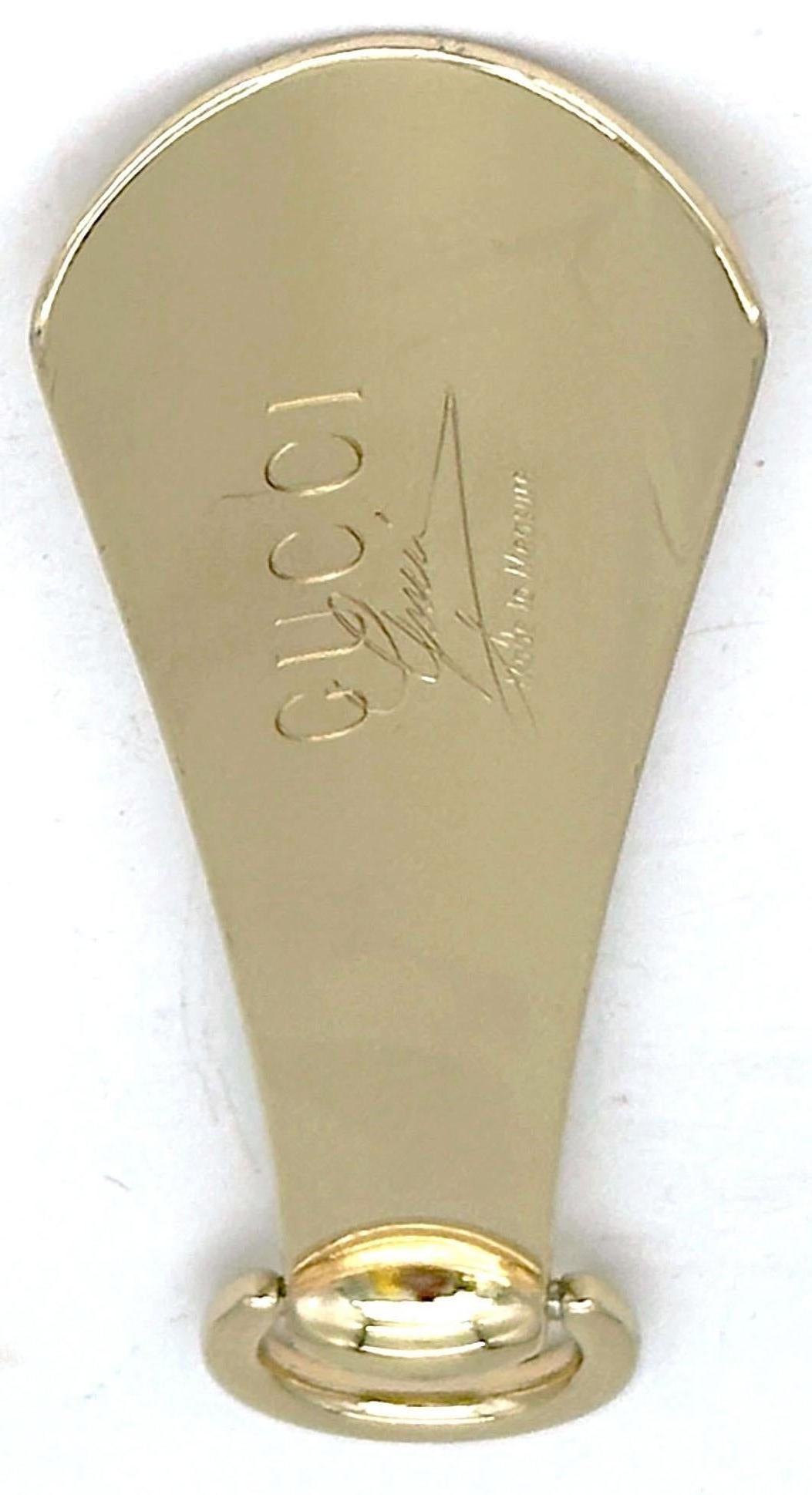 Moderno Calzascarpe in ottone dorato di Gucci degli anni '70 con anello con morsetto oscillante, Italia in vendita