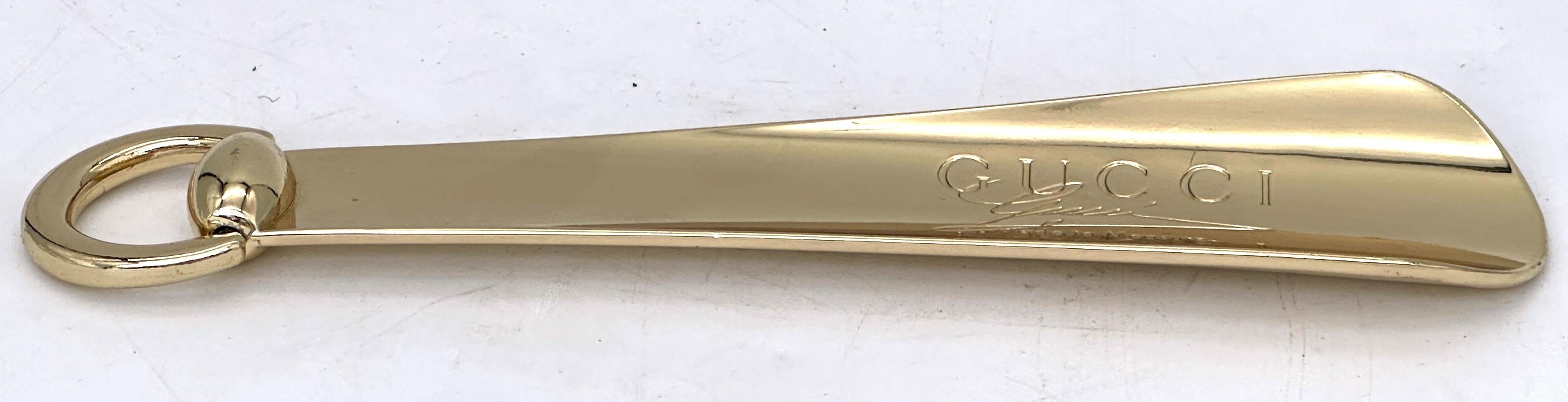XX secolo Calzascarpe in ottone dorato di Gucci degli anni '70 con anello con morsetto oscillante, Italia in vendita