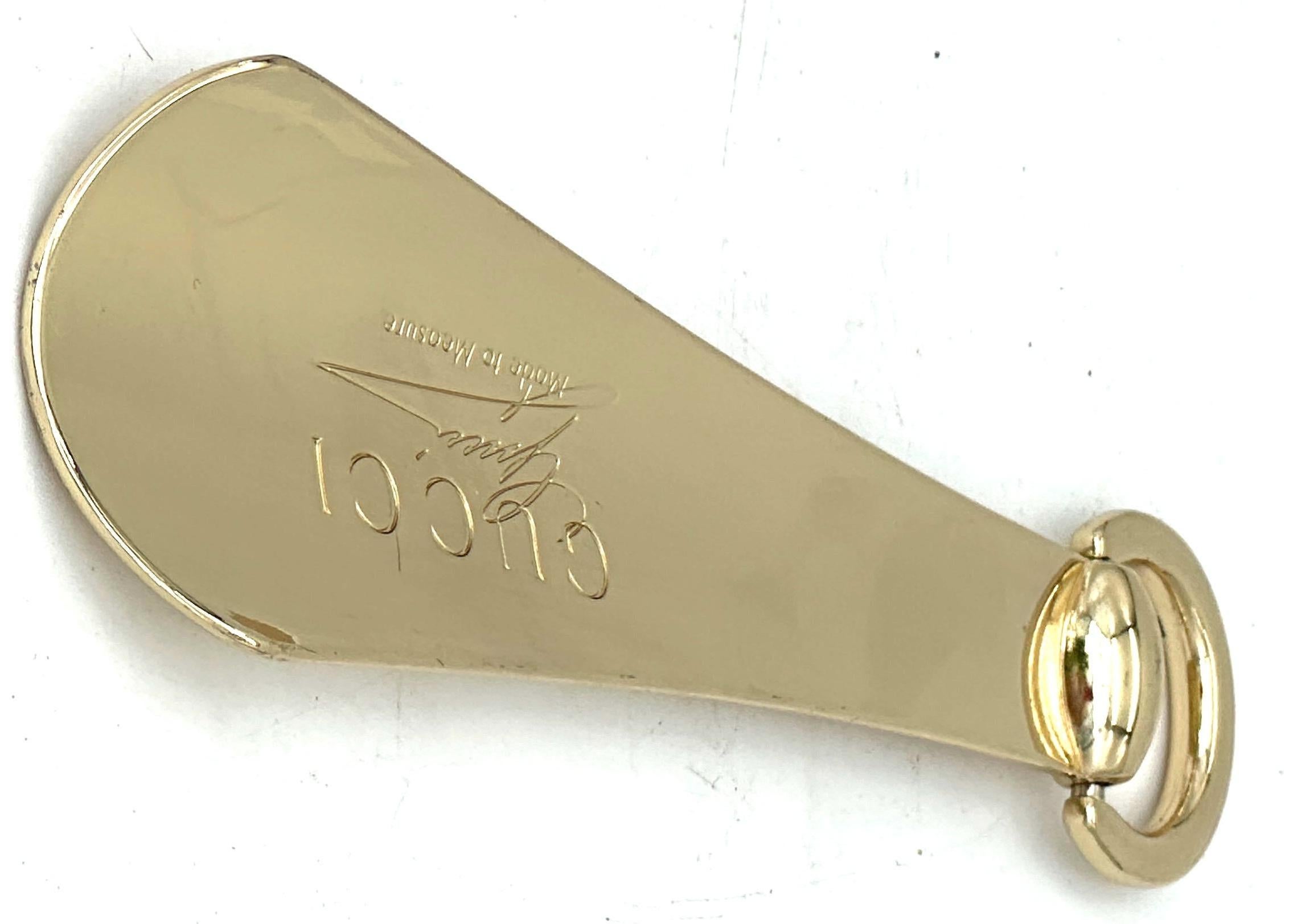 Calzascarpe in ottone dorato di Gucci degli anni '70 con anello con morsetto oscillante, Italia in vendita 1