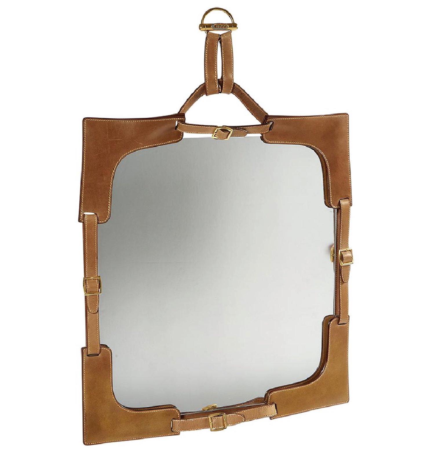 Few vintage artifacts for the home express effortless chic with such clarity as this leather-framed mirror made by Gucci in the 1970s. This uncommon piece delivers all the best Gucci connotations; it is at once luxurious and casual, Italian and