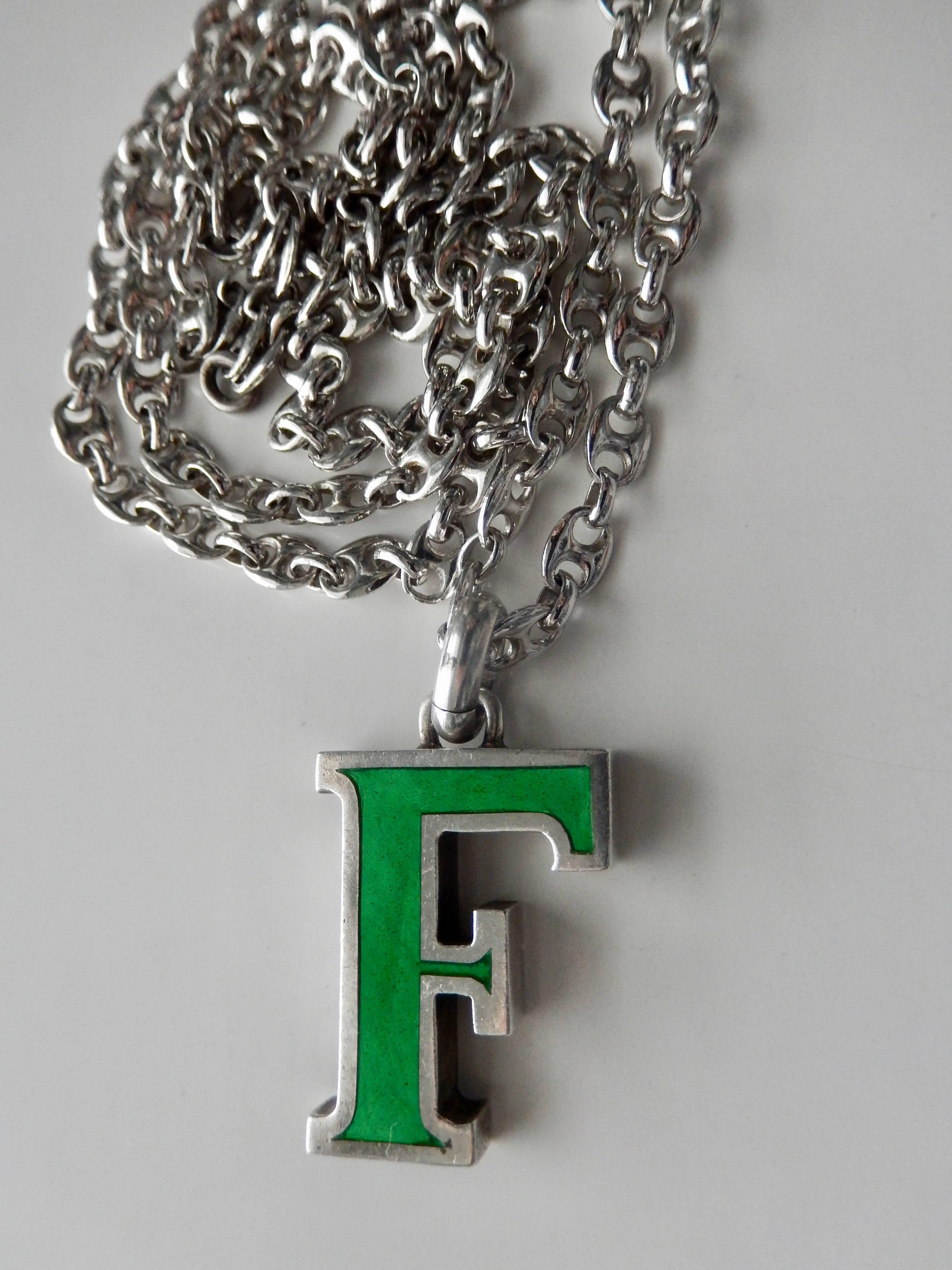 A very chic Seventies green enamel and sterling silver pendant from GUCCI of the initial 