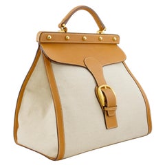 1970s Gucci Toile and Camel Leather Top Handle Bag
