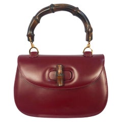 1970s Gucci Wine Leather Handbag with Bamboo Handle