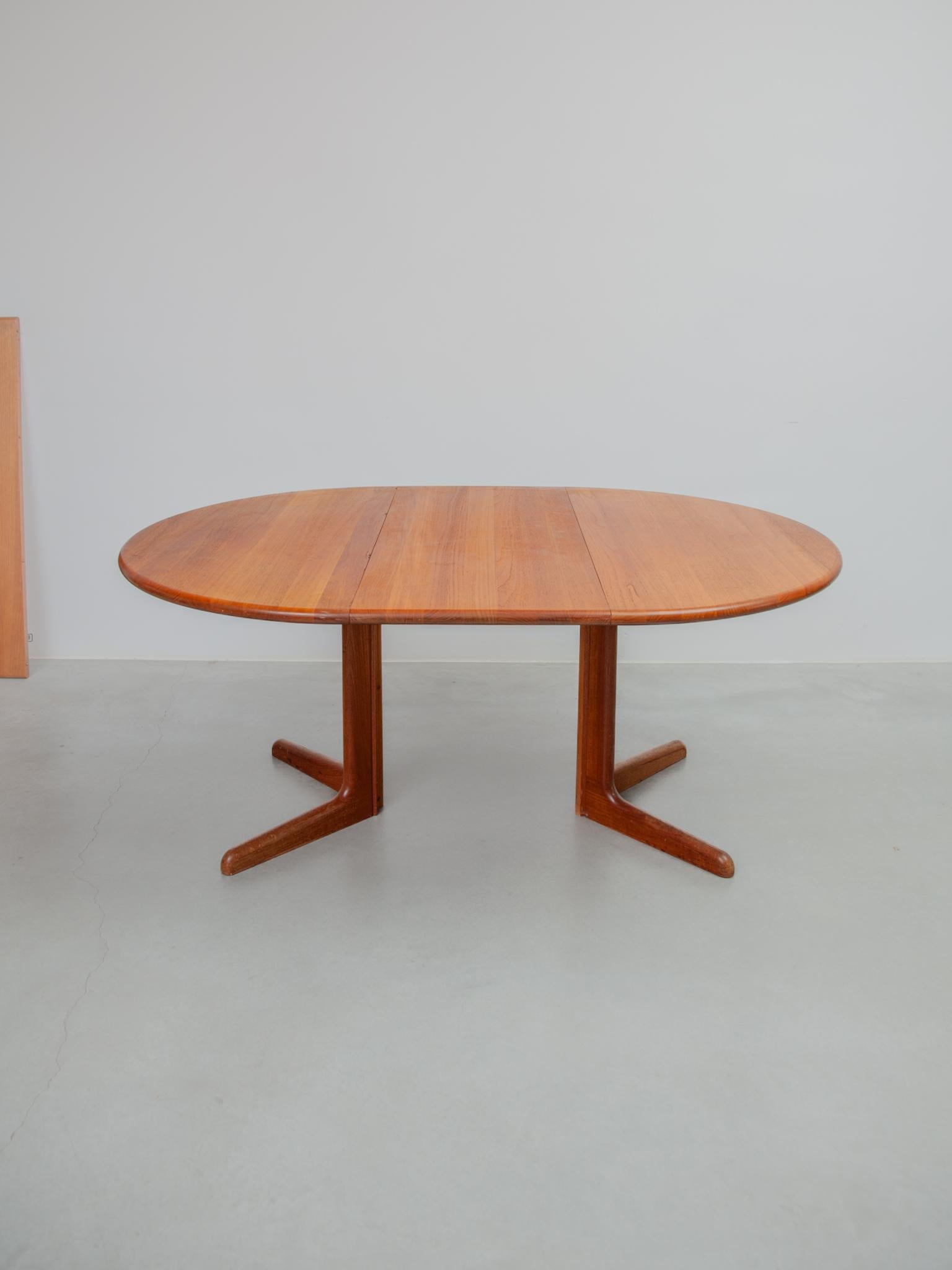 Hand-Crafted 1970s Gudme Round with two extensions Extendable in Oval Dining Table Solid Teak For Sale