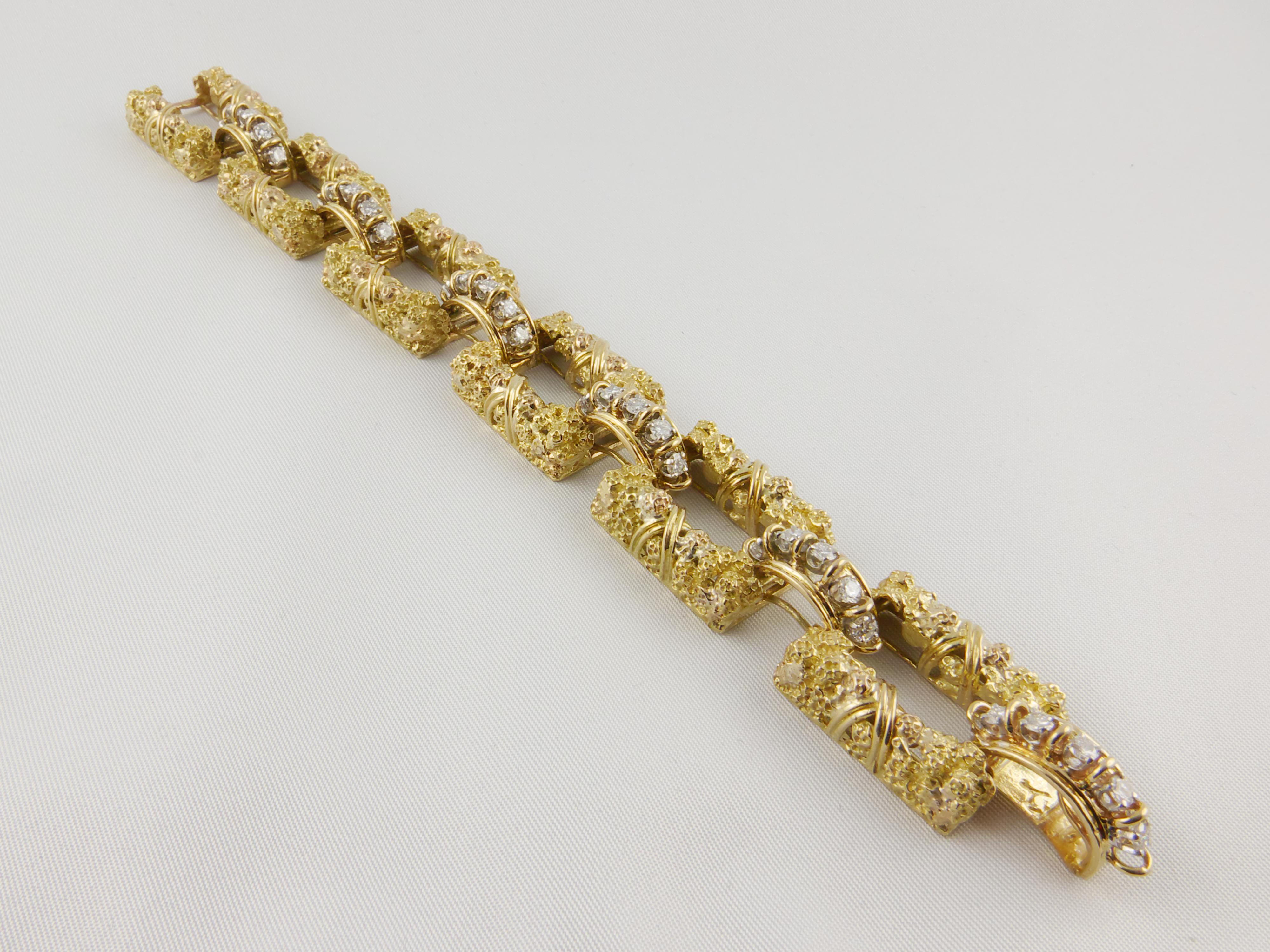 This elegant link Bracelet was finely crafted in the 1970's. Made by the modernist  jeweler Jack Gutschneider. The Bracelet is in 18K Yellow Gold with six beveled rectangle shaped raised links held together by six diamond bar links. Each link is