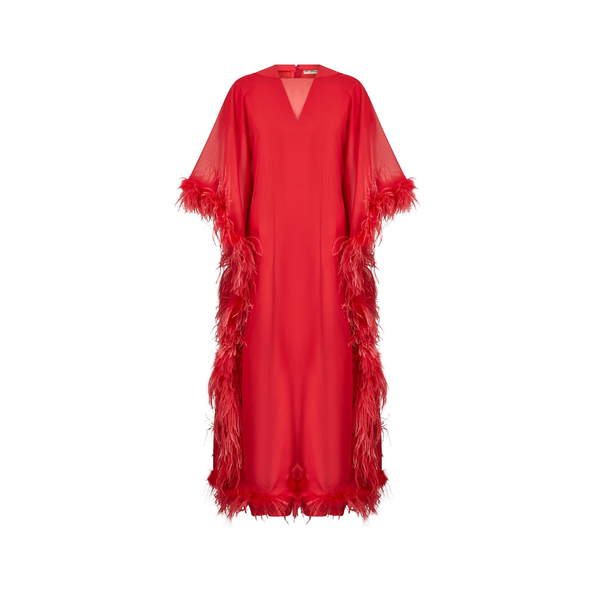 This original 1970s red feather dress ensemble by Guy Laroche is a high-end boutique piece or demi couture order and the perfect statement piece for any event or party. The ensemble is actually made up of two completely separate dresses which could